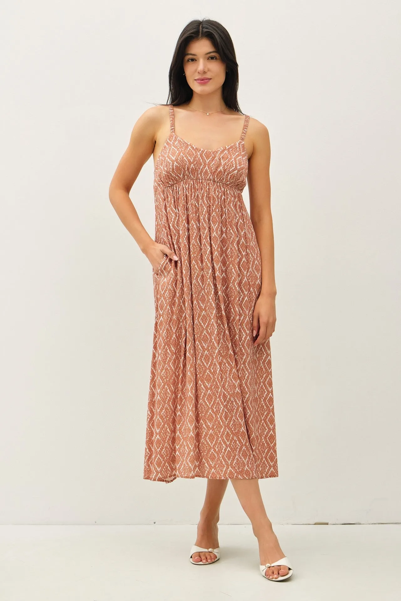 Rust Printed Sleeveless Midi Dress sold by Pinkblush