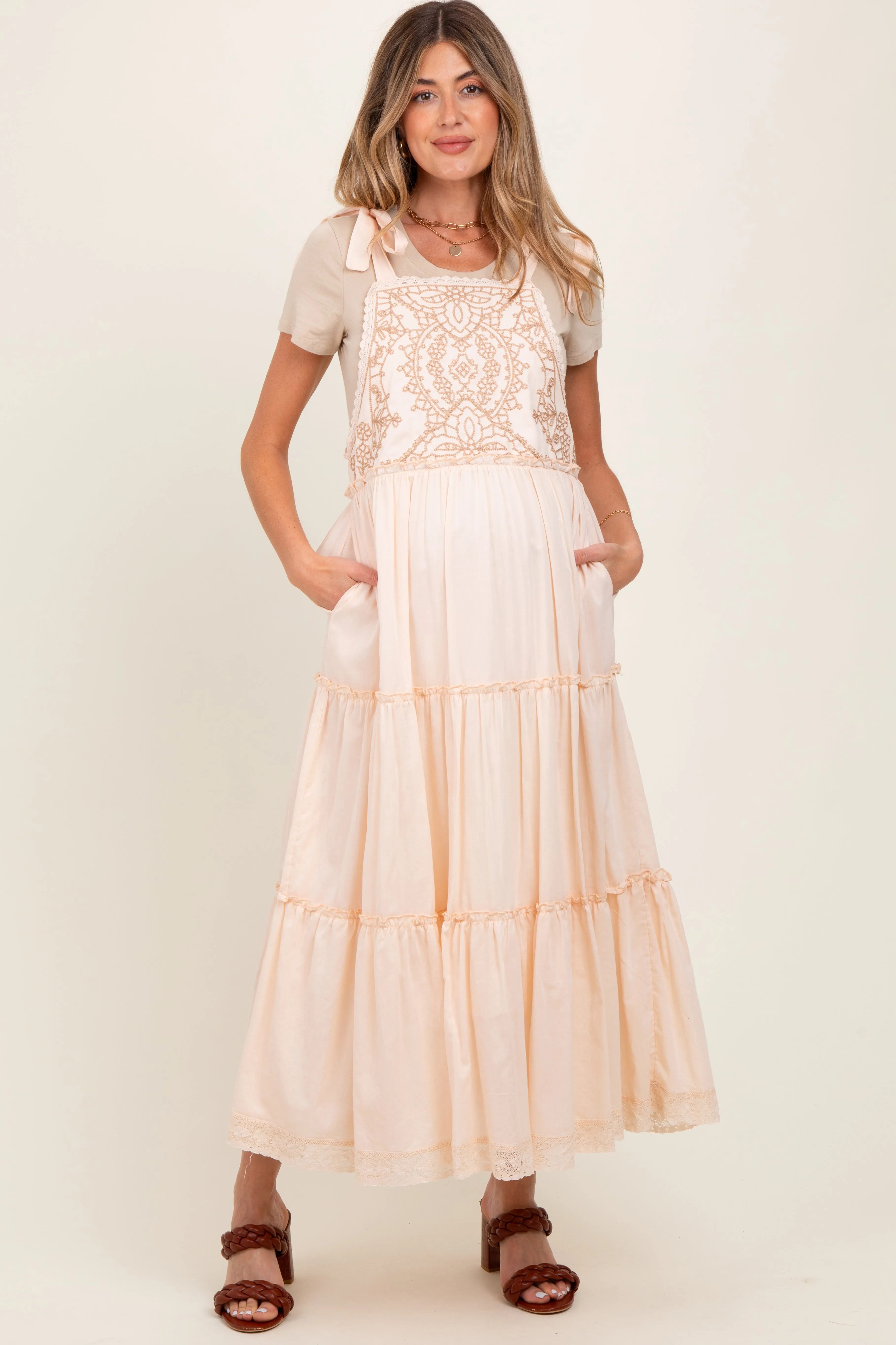 Cream Embroidered Ruffle Tiered Apron Maternity Dress sold by Pinkblush