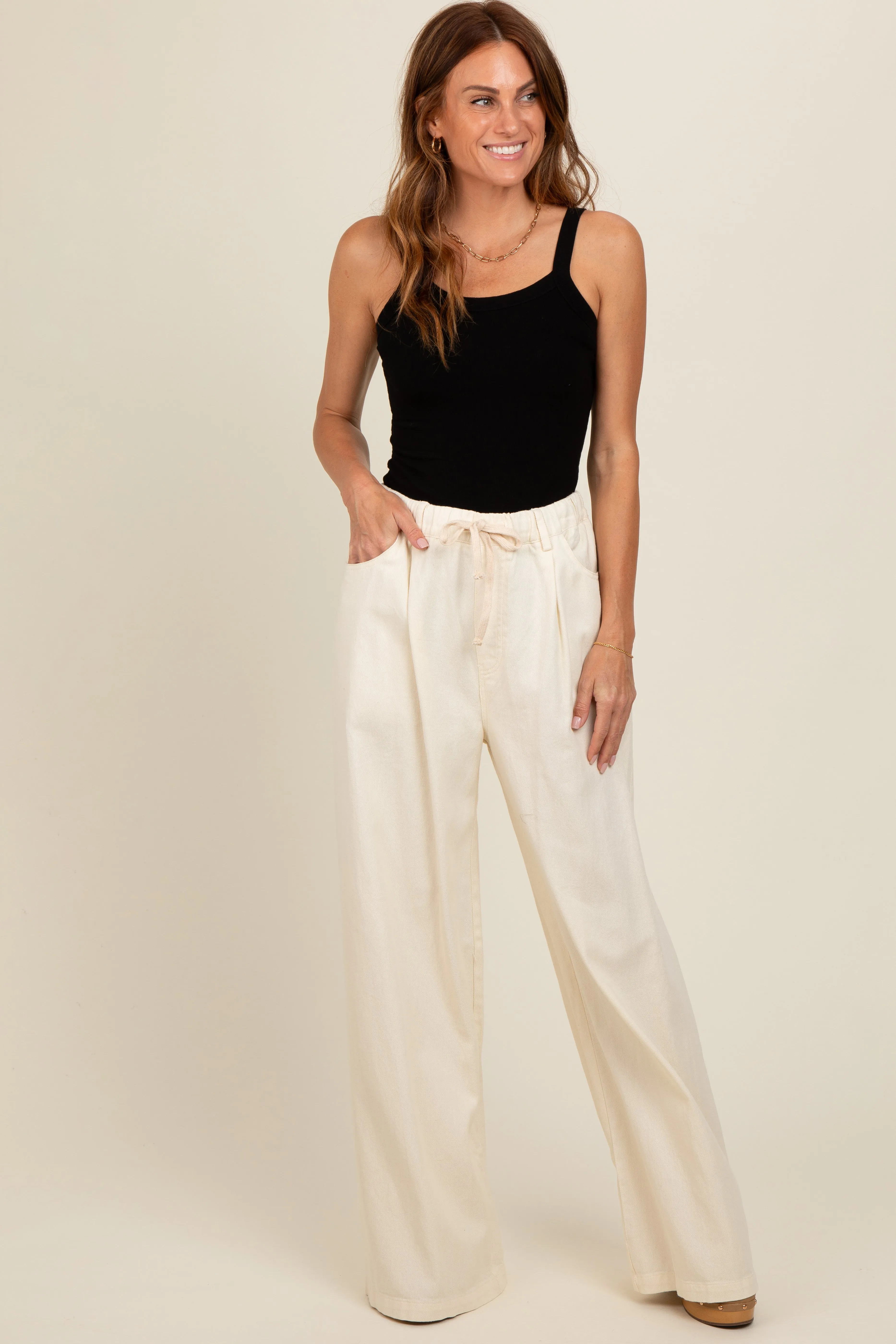 Ivory Drawstring Wide Leg Pants sold by Pinkblush