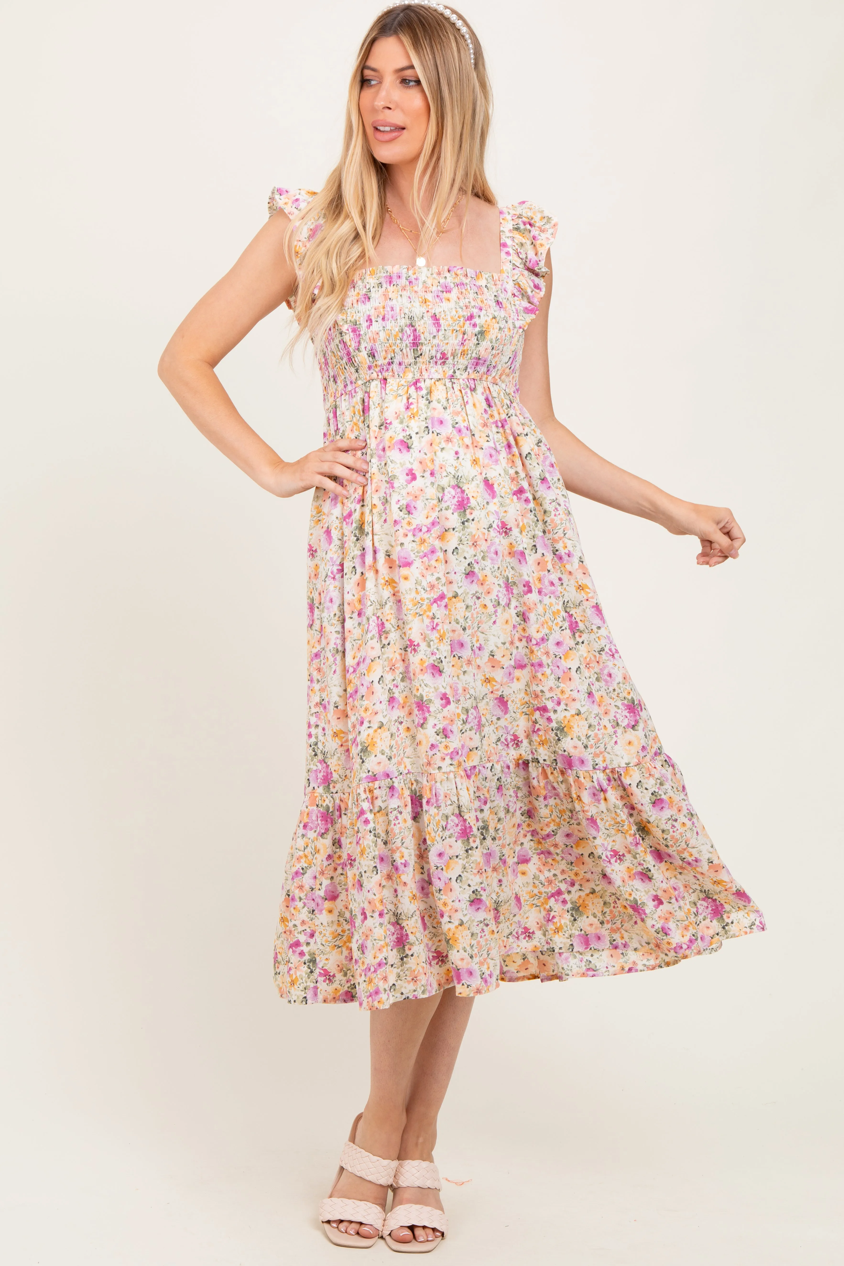 Multi Color Floral Flutter Sleeve Smocked Maternity Midi Dress sold by Pinkblush