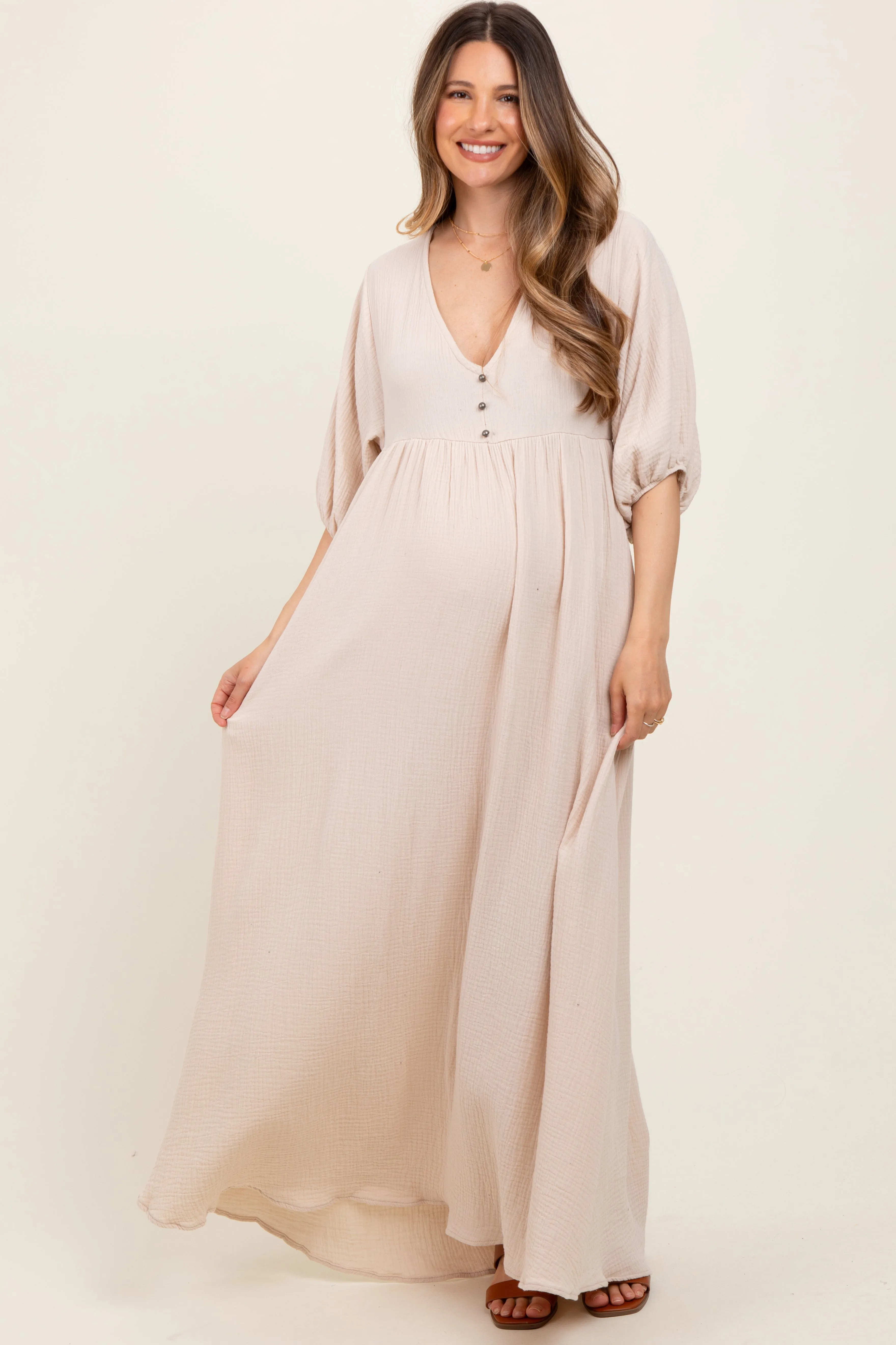 Beige Solid Woven Elbow Sleeve V-Neck Button Down Maternity Maxi Dress sold by Pinkblush