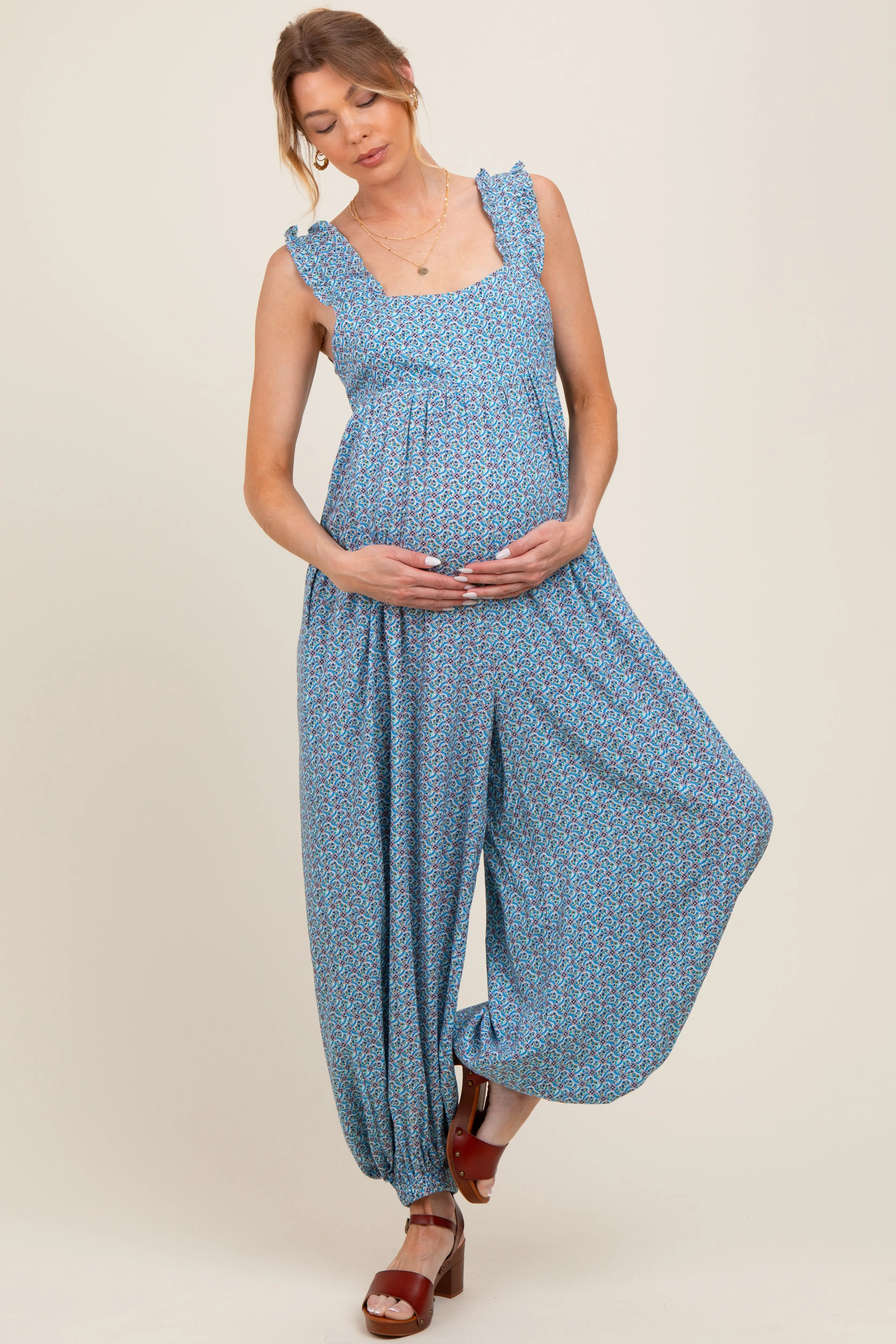 Blue Floral Ruffle Strap Barrel Leg Maternity Jumpsuit sold by Pinkblush