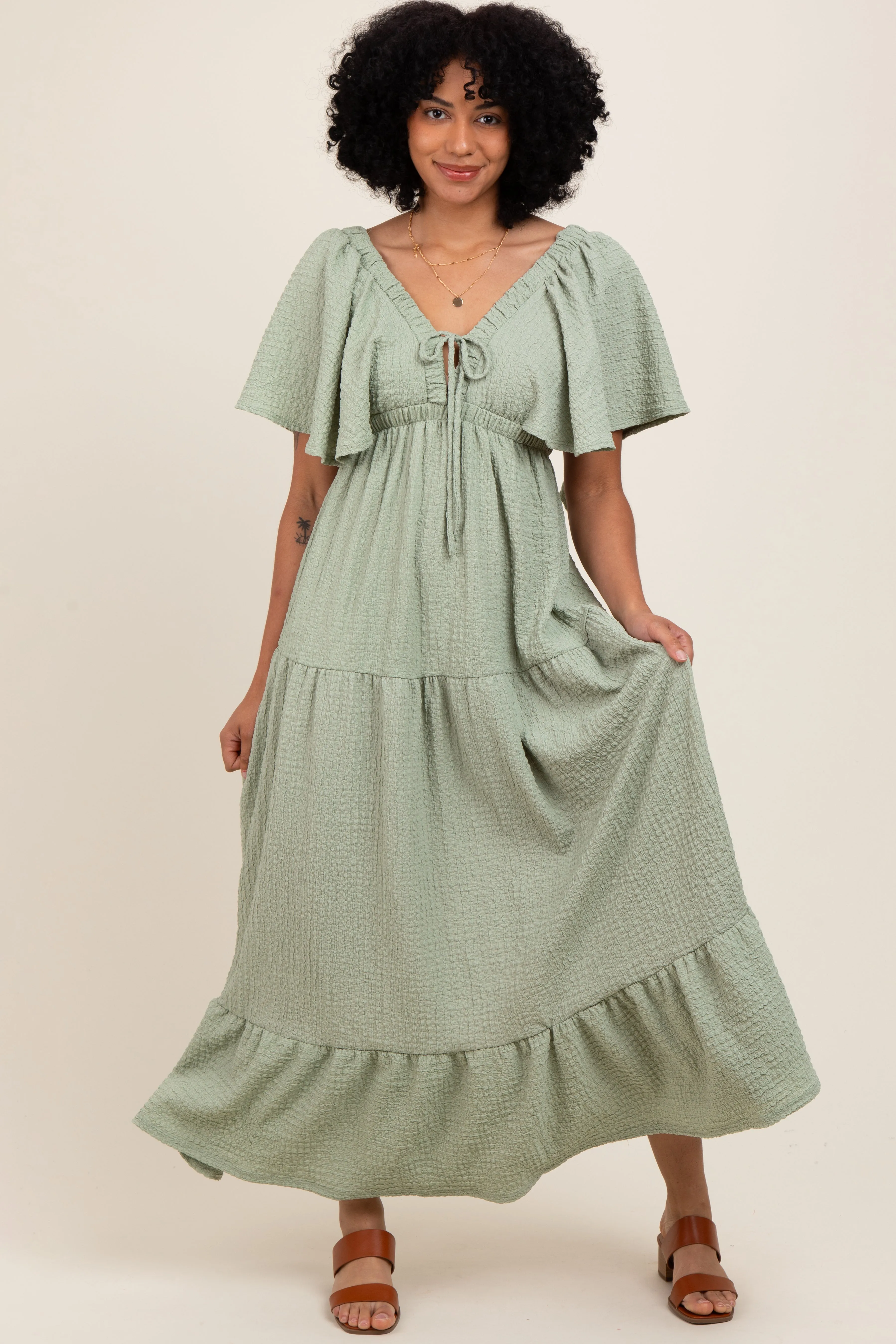 Sage Woven Textured Flutter Sleeve V-Neck Tiered Maxi Dress sold by Pinkblush
