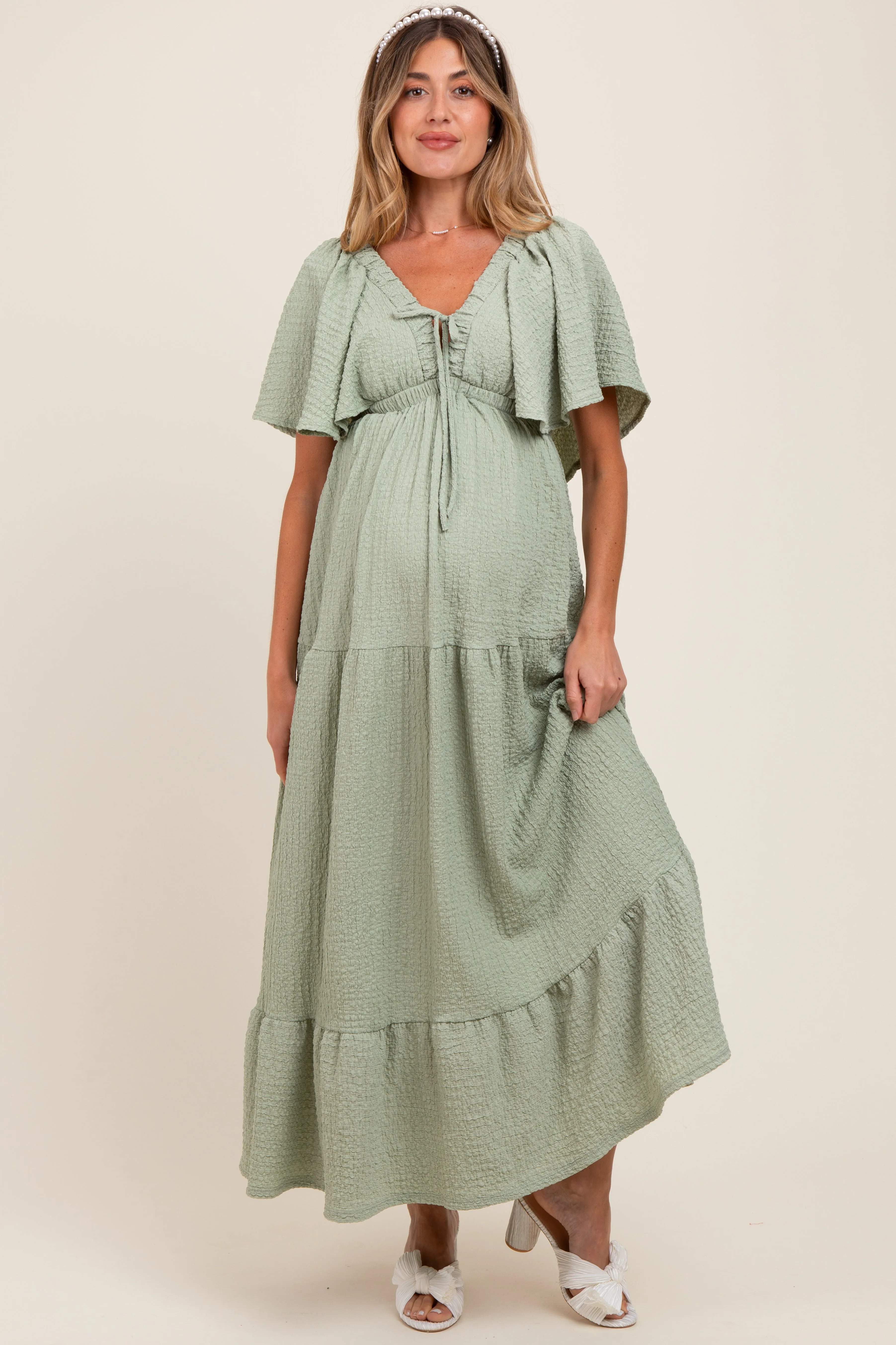 Sage Woven Textured Flutter Sleeve V-Neck Tiered Maternity Maxi Dress sold by Pinkblush