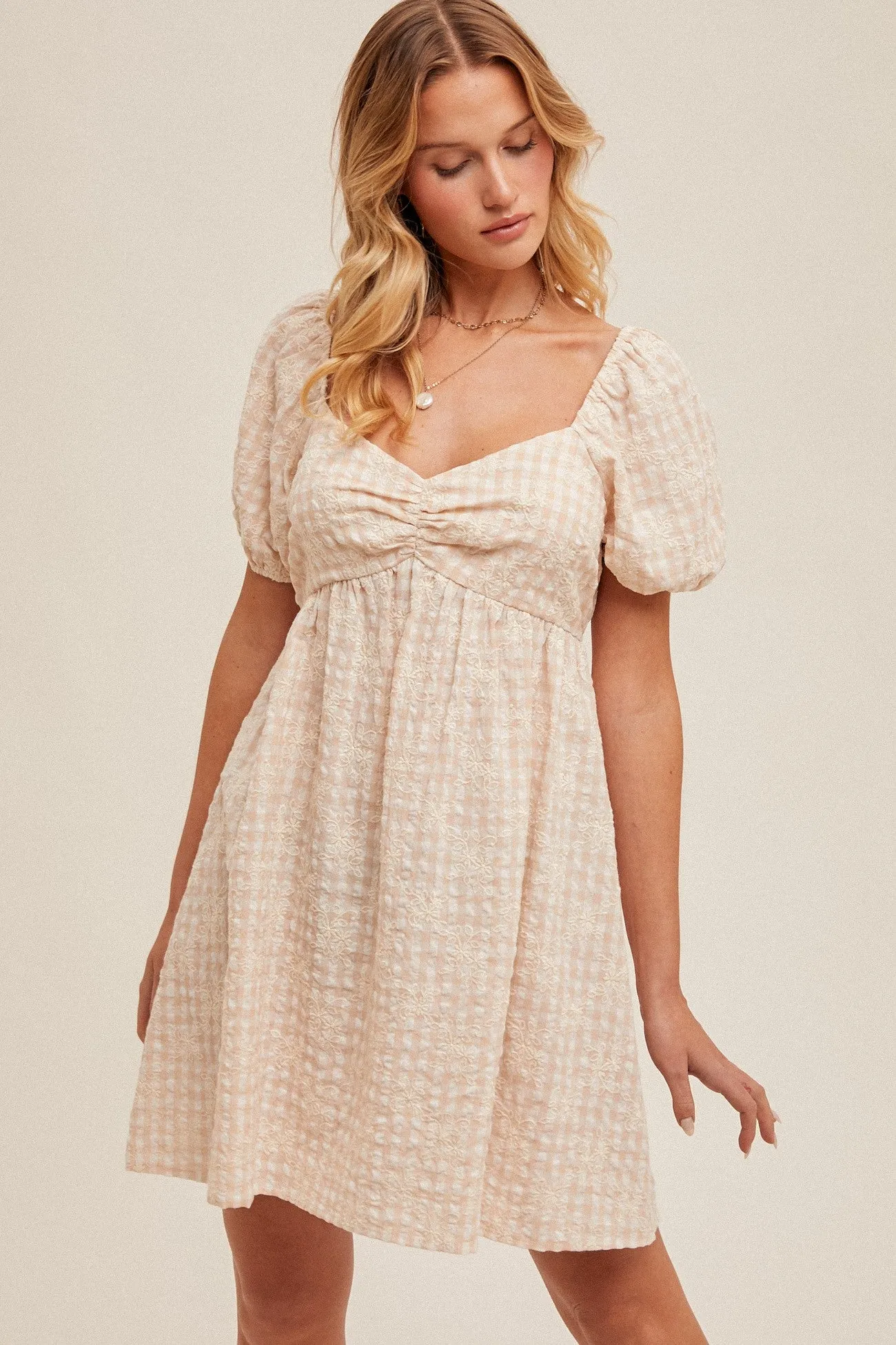 Beige Embroidered Gingham Sweetheart Neck Mini Dress sold by Pinkblush