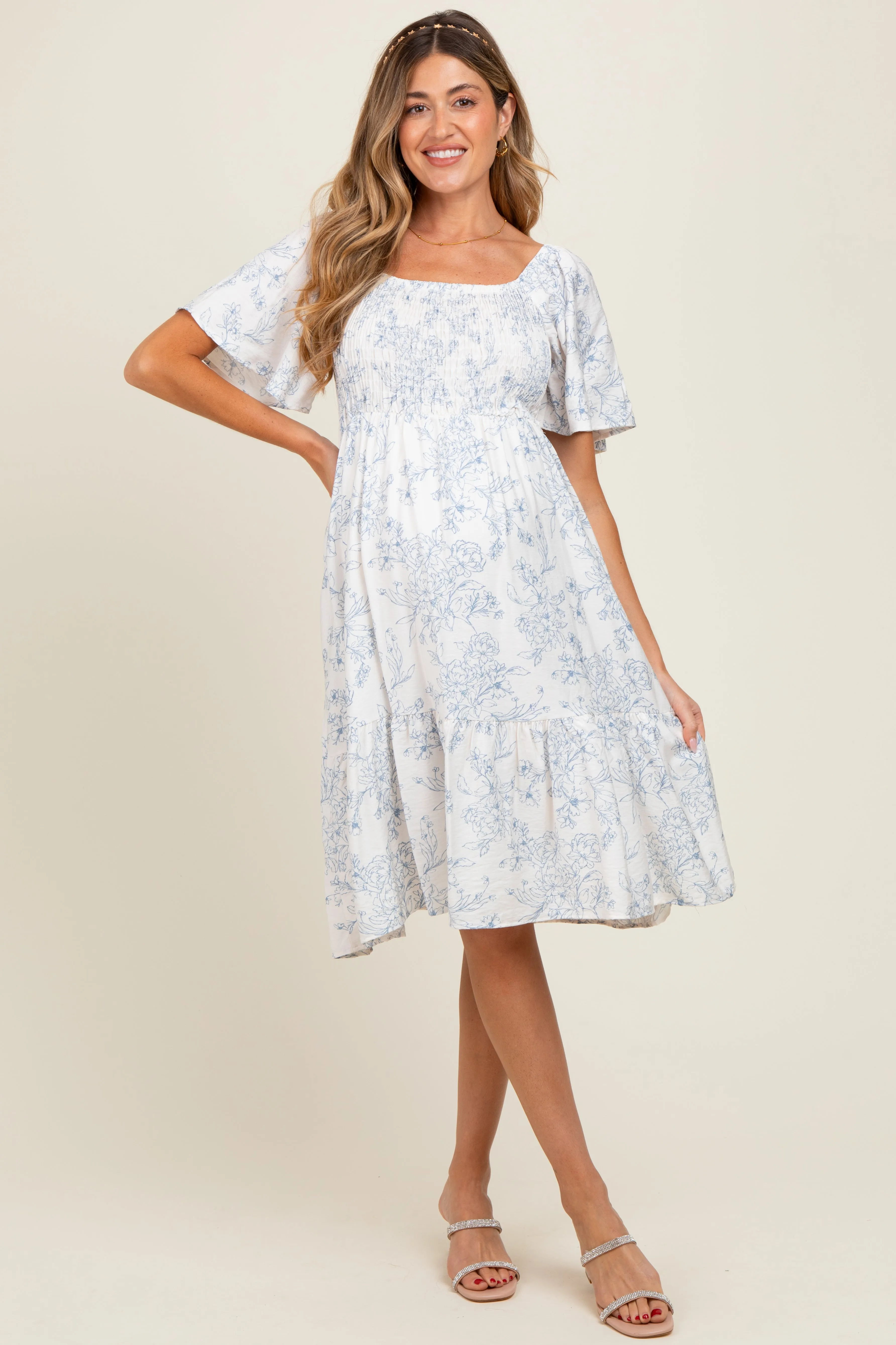 Cream Floral Smocked Flutter Sleeve Maternity Midi Dress sold by Pinkblush