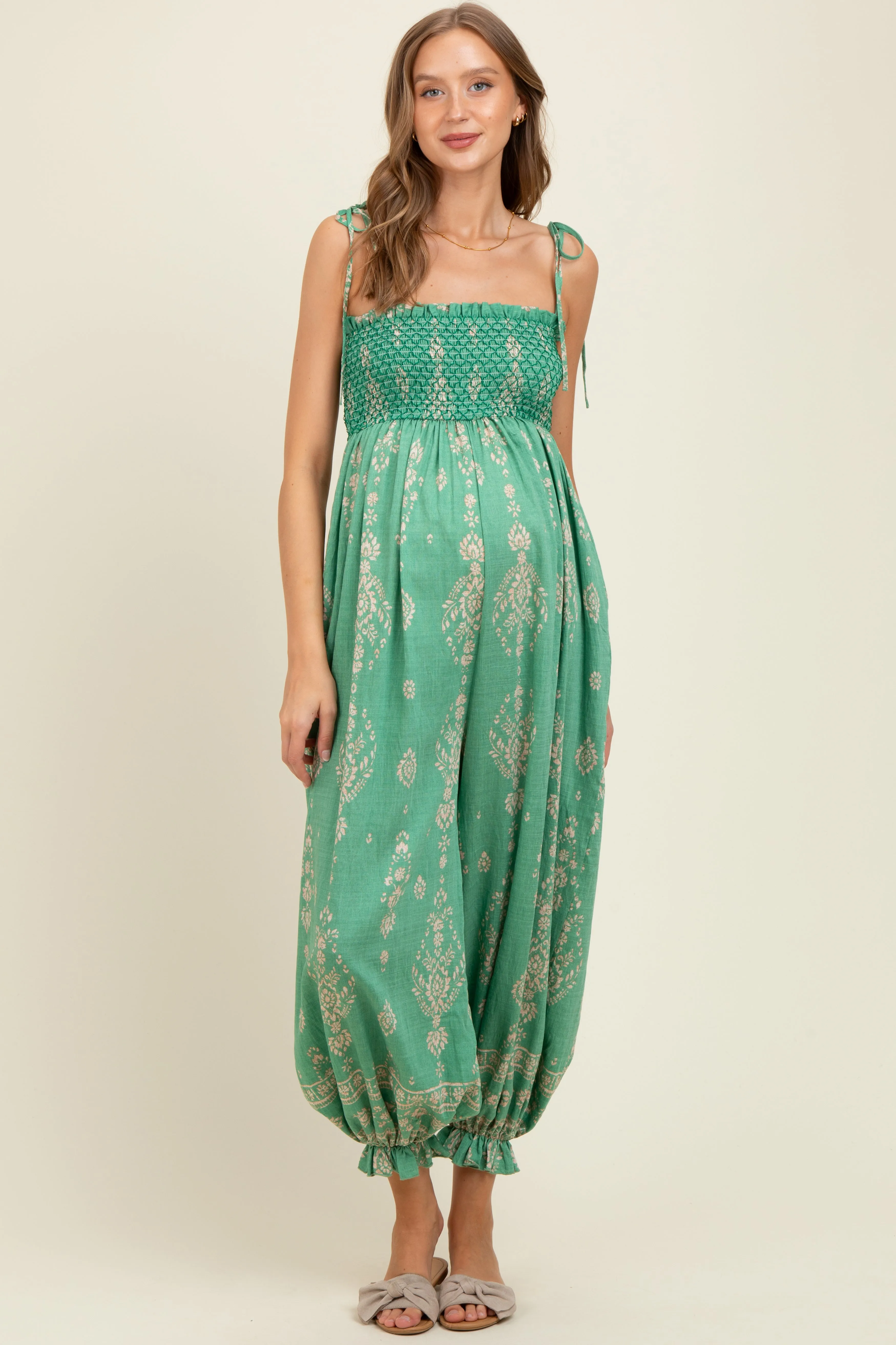 Green Printed Smocked Shoulder Tie Maternity Jumpsuit sold by Pinkblush product image thumbnail 2