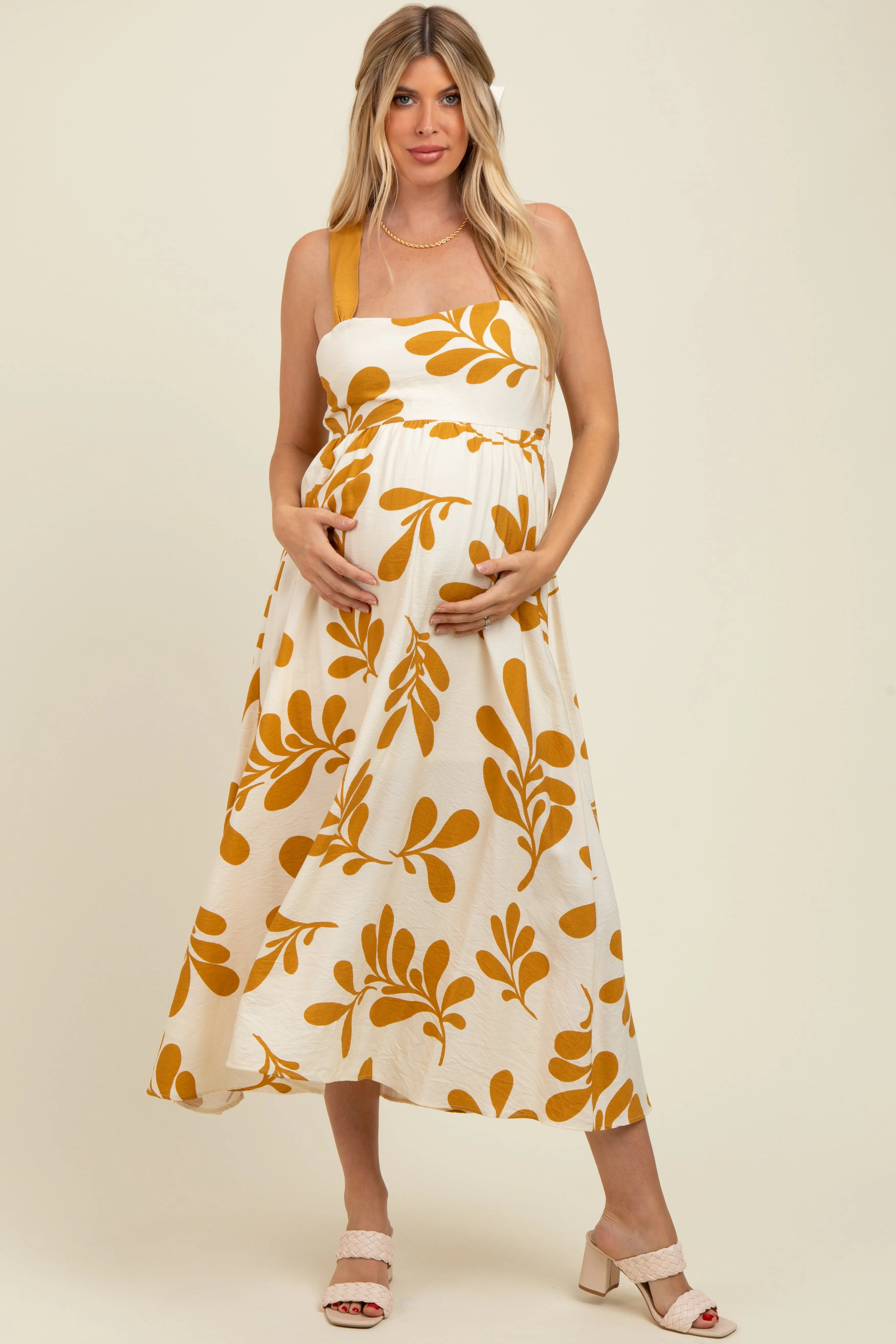 Yellow Leaf Print Tie Back Cutout Maternity Midi Dress sold by Pinkblush