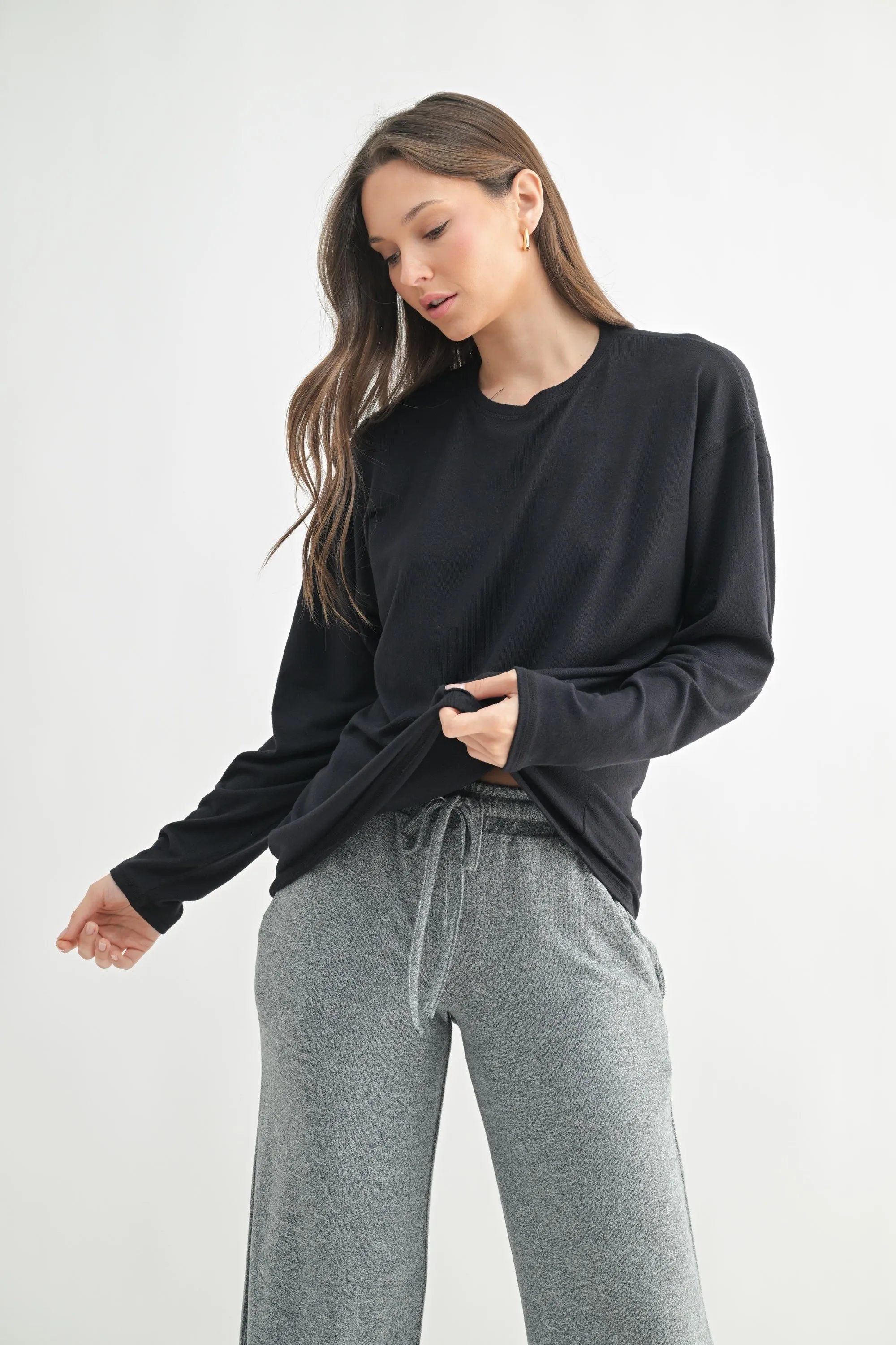 Black Relaxed Fit Long Sleeve Top sold by Pinkblush