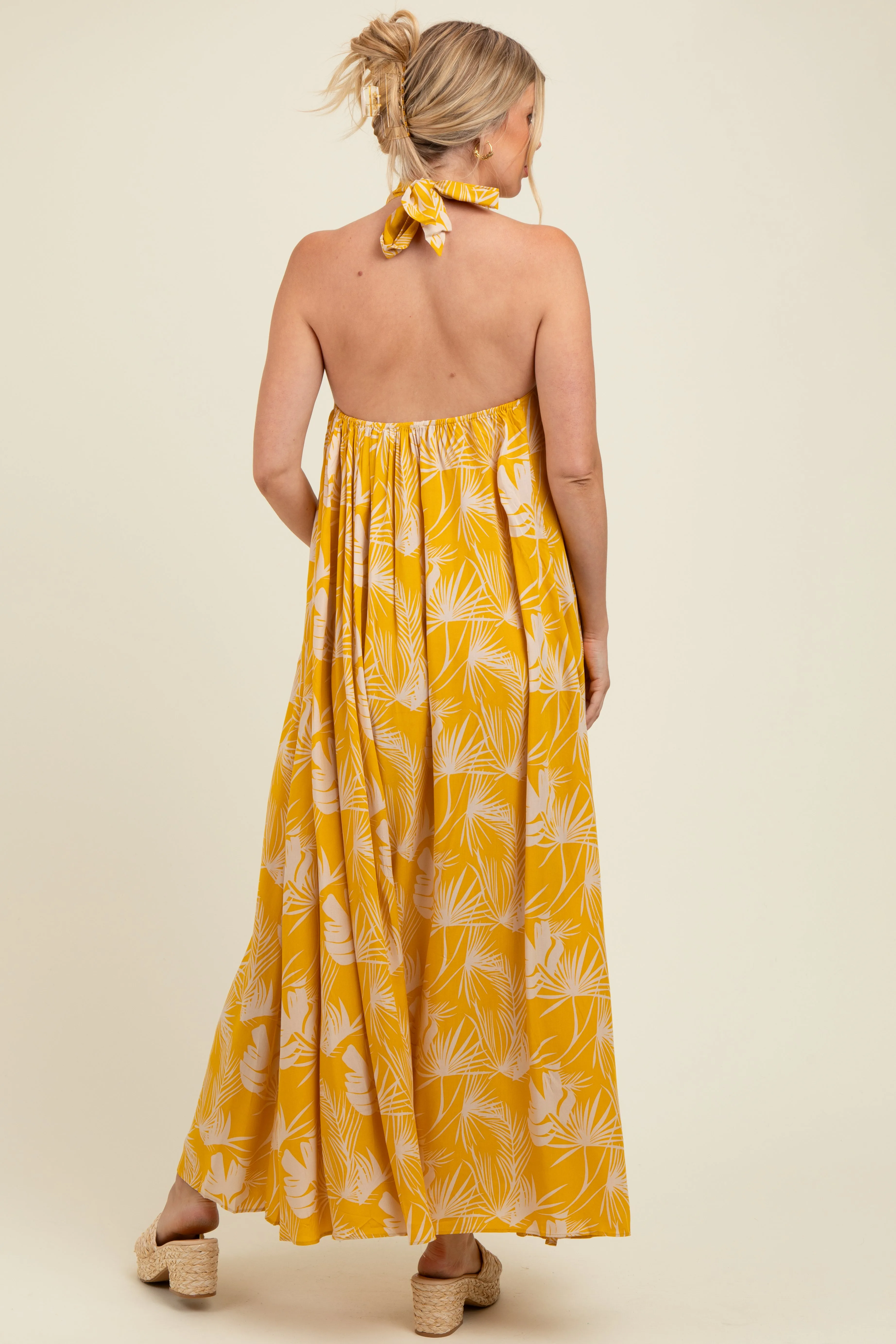 Yellow Leaf Print Halter Open Back Maternity Maxi Dress sold by Pinkblush product image thumbnail 2