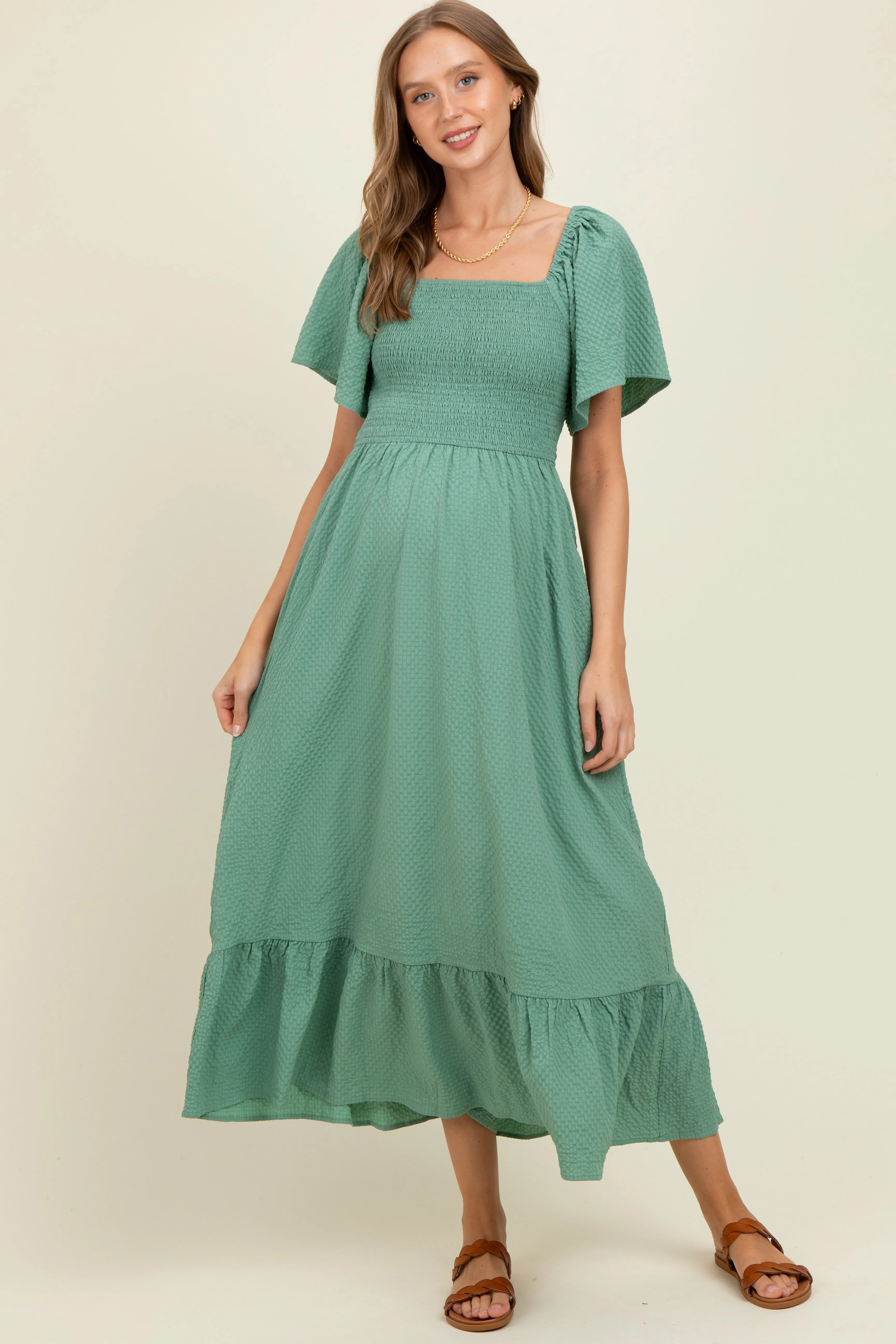 Green Convertible Stretchy Smocked Maternity Maxi Dress sold by Pinkblush