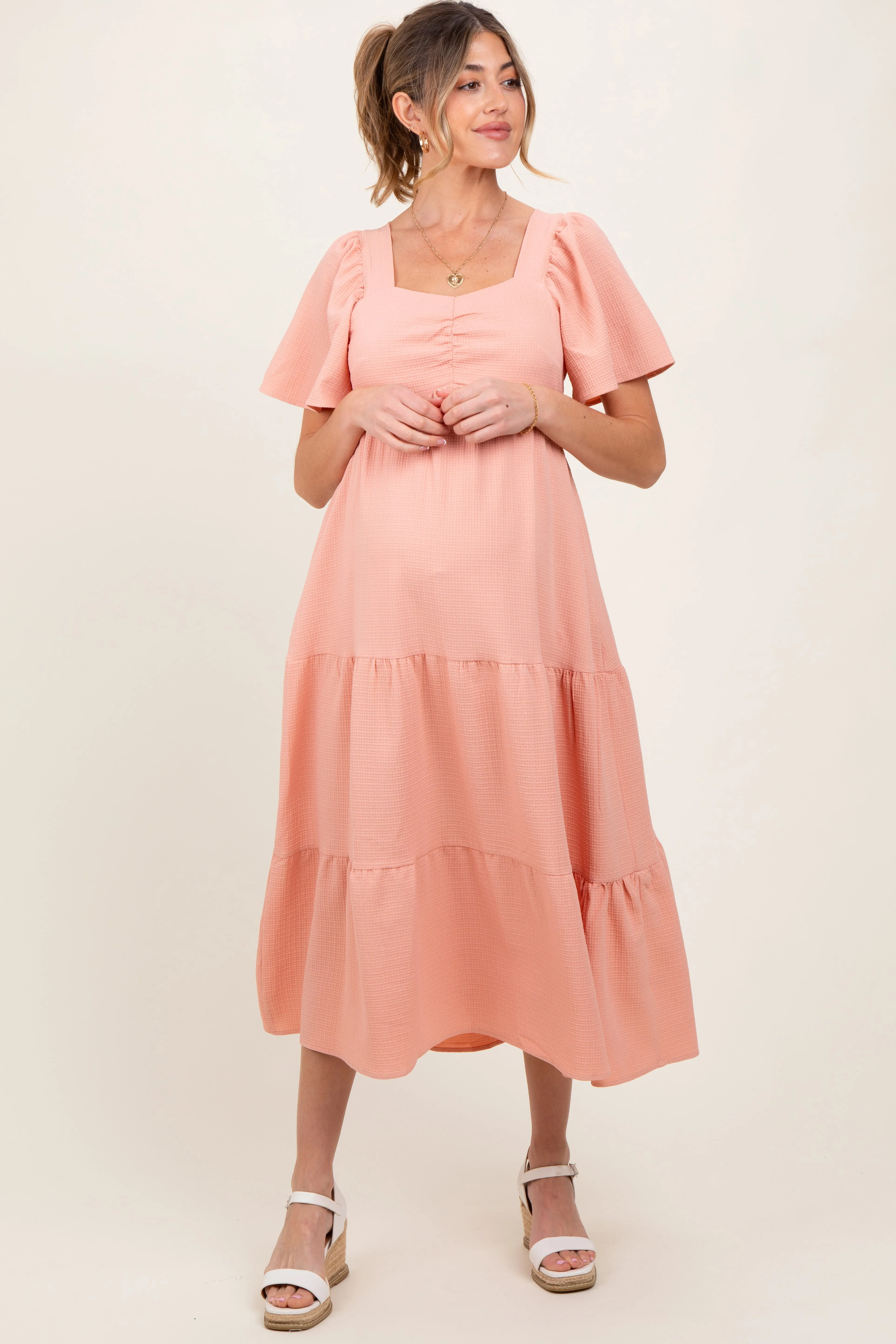 Peach Sweetheart Neck Short Puff Sleeve Tiered Maternity Midi Dress sold by Pinkblush