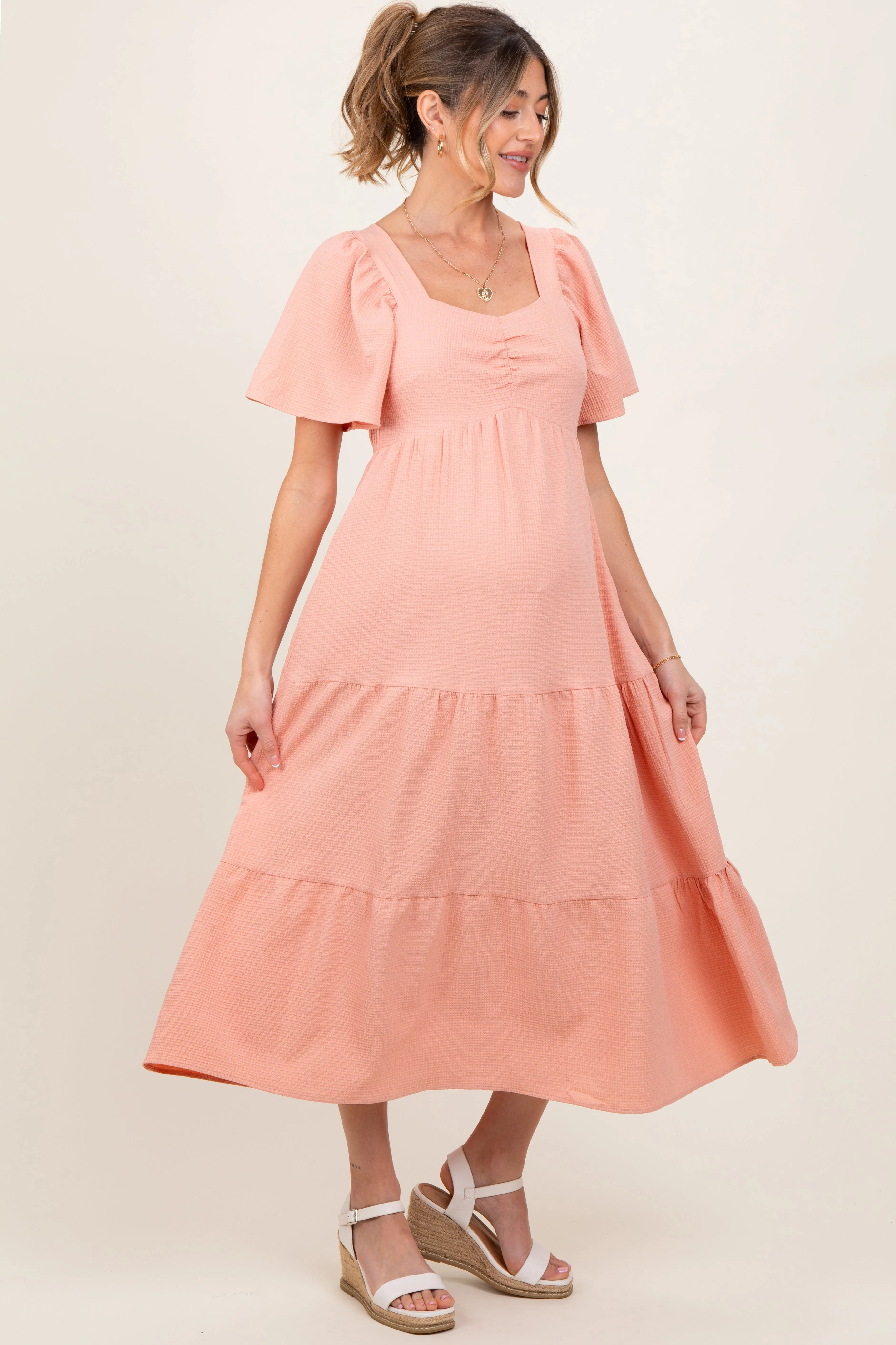Peach Sweetheart Neck Short Puff Sleeve Tiered Maternity Midi Dress sold by Pinkblush product image thumbnail 3