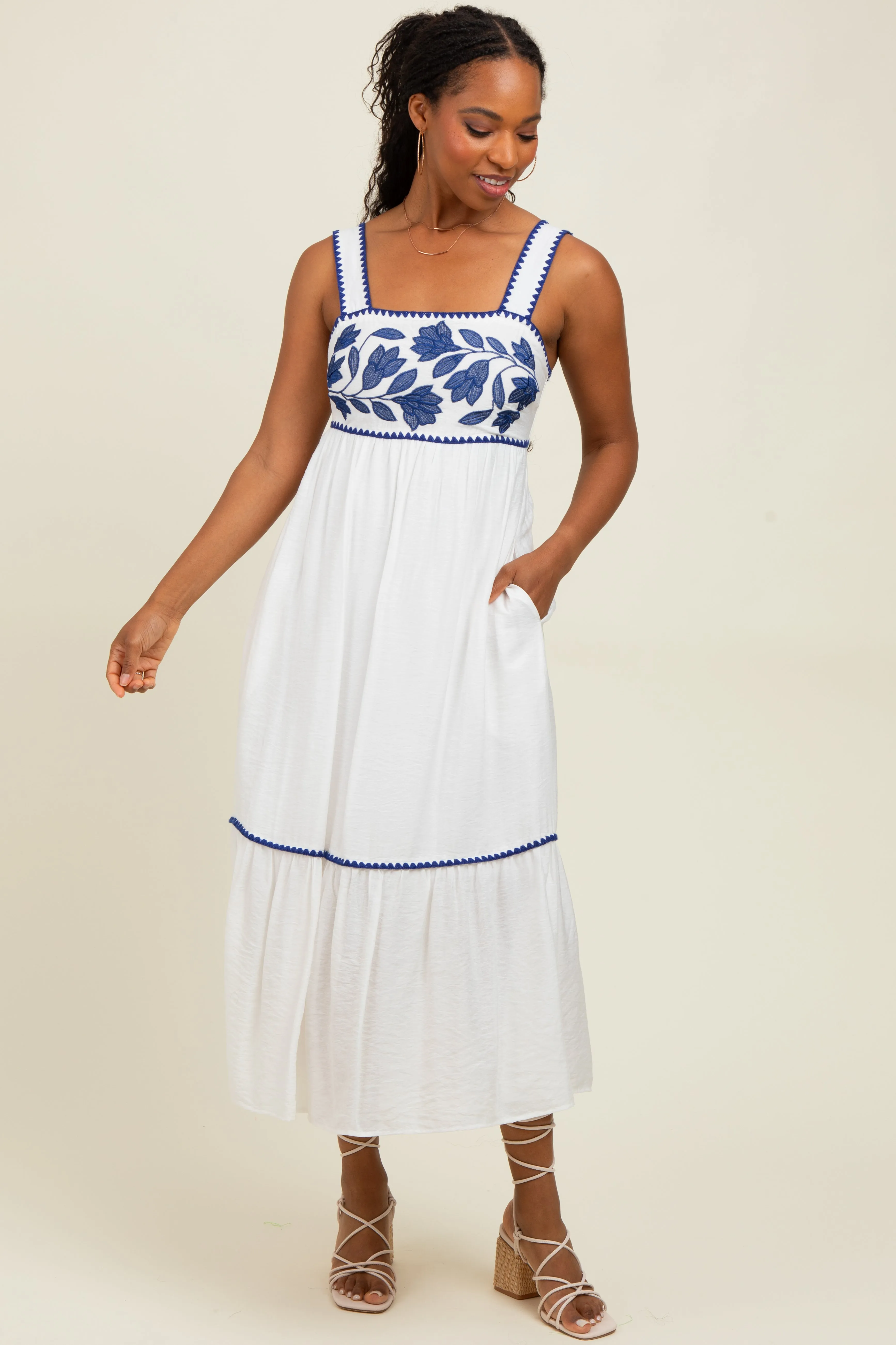 White Floral Embroidered Cutout Tie Back Midi Dress sold by Pinkblush