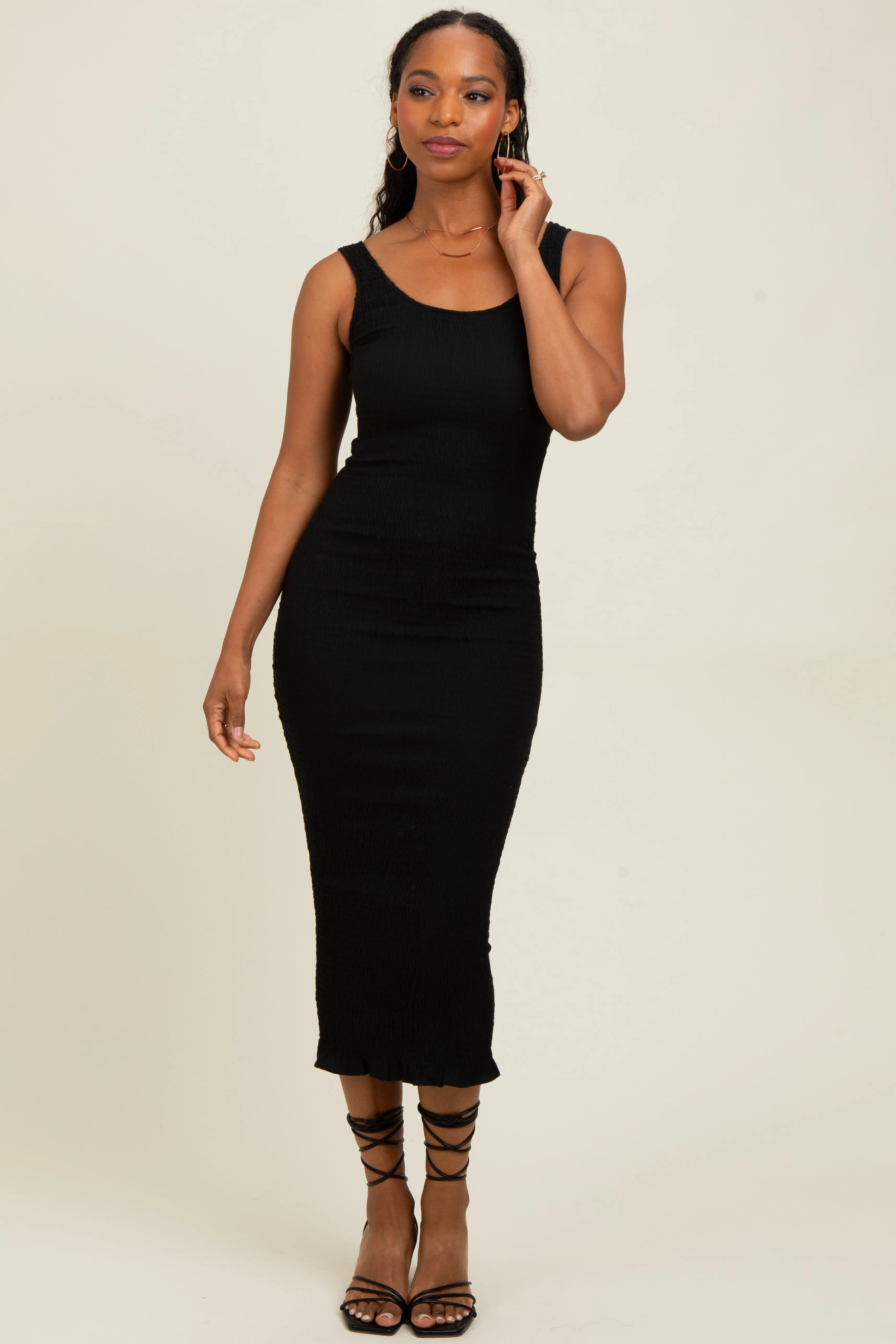 Black Smocked Sleeveless Ruffle Hem Fitted Dress sold by Pinkblush