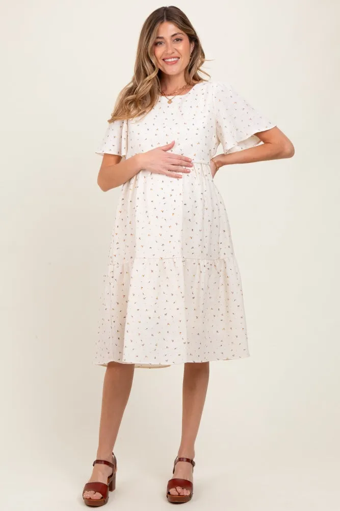 Ivory Floral Short Sleeve Tiered Maternity Midi Dress sold by Pinkblush