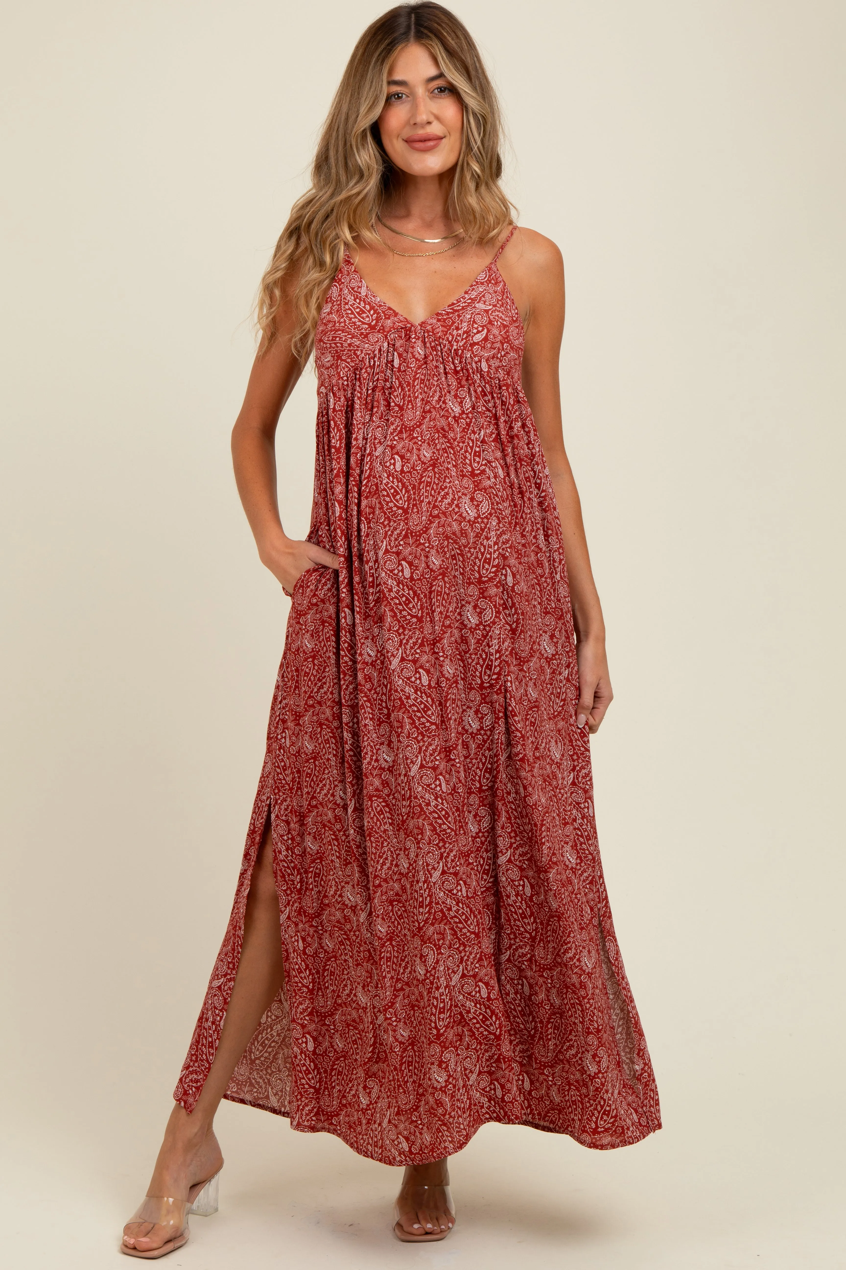 Rust Paisley Print Sleeveless Side Slit Maternity Maxi Dress sold by Pinkblush