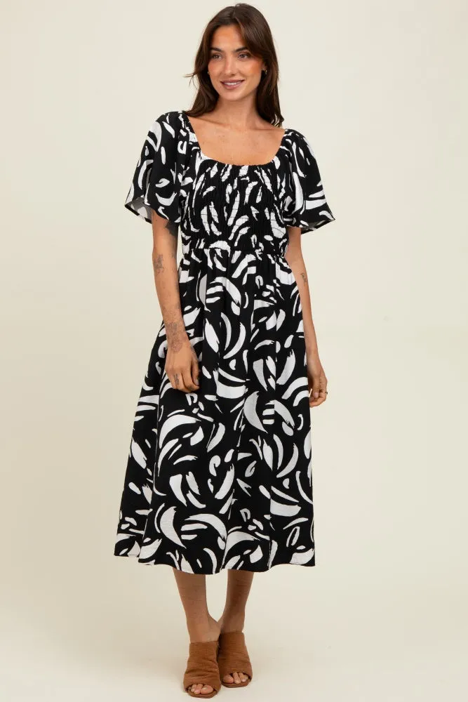 Black Printed Smocked Maternity Midi Dress sold by Pinkblush product image thumbnail 4