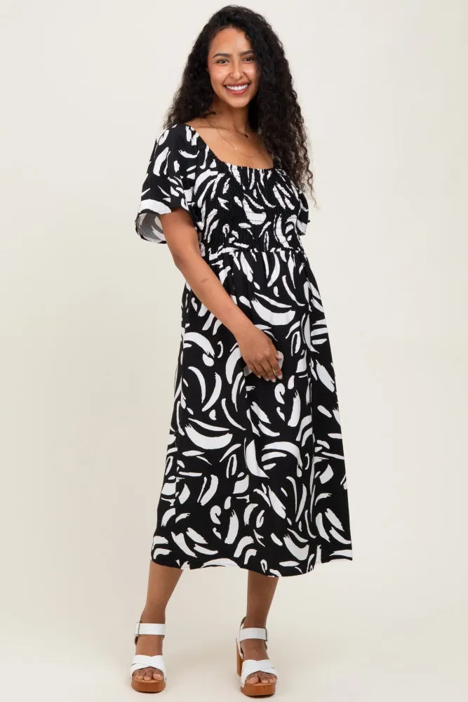 Black Printed Smocked Maternity Midi Dress sold by Pinkblush