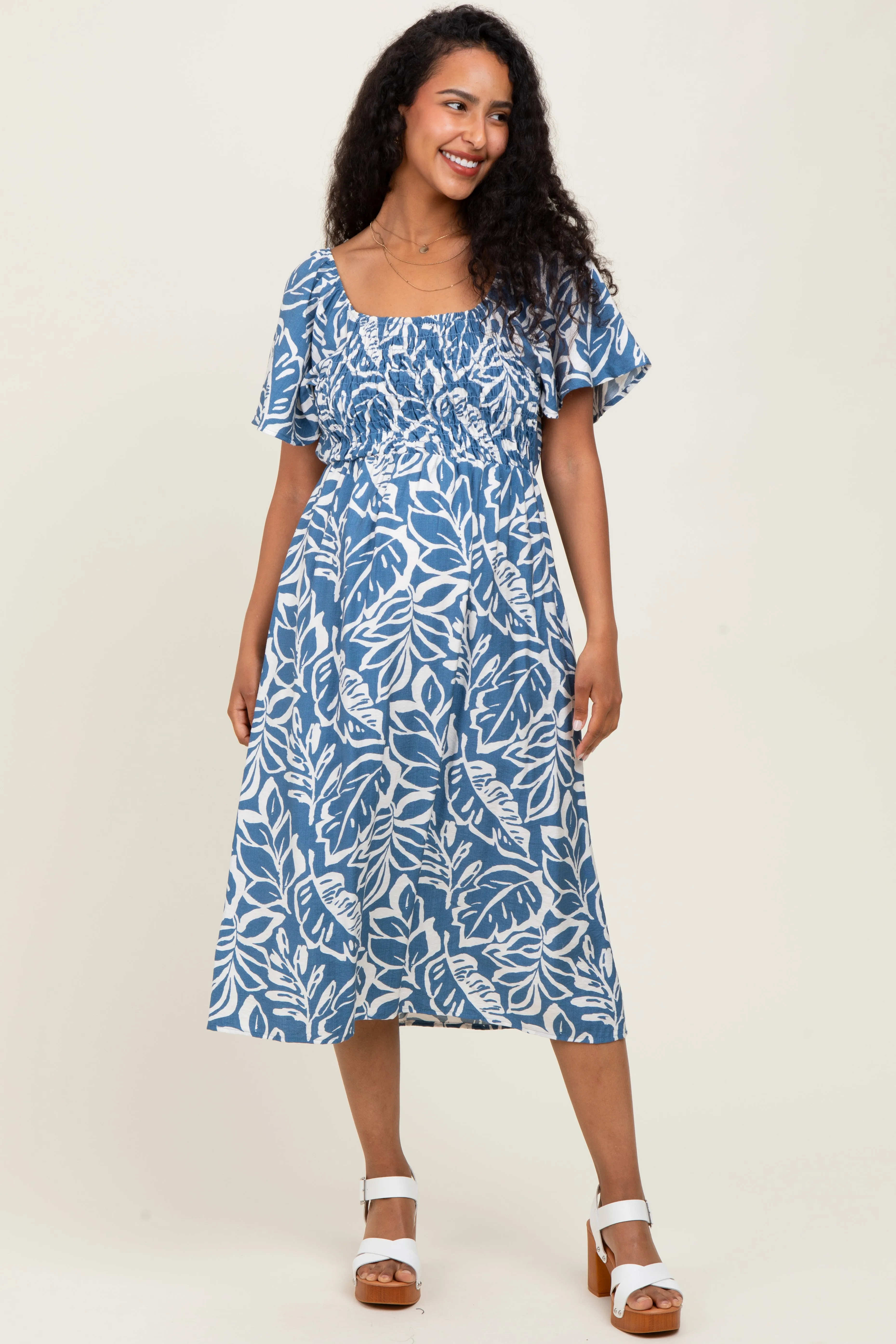 Light Navy Leaf Print Smocked Maternity Midi Dress sold by Pinkblush