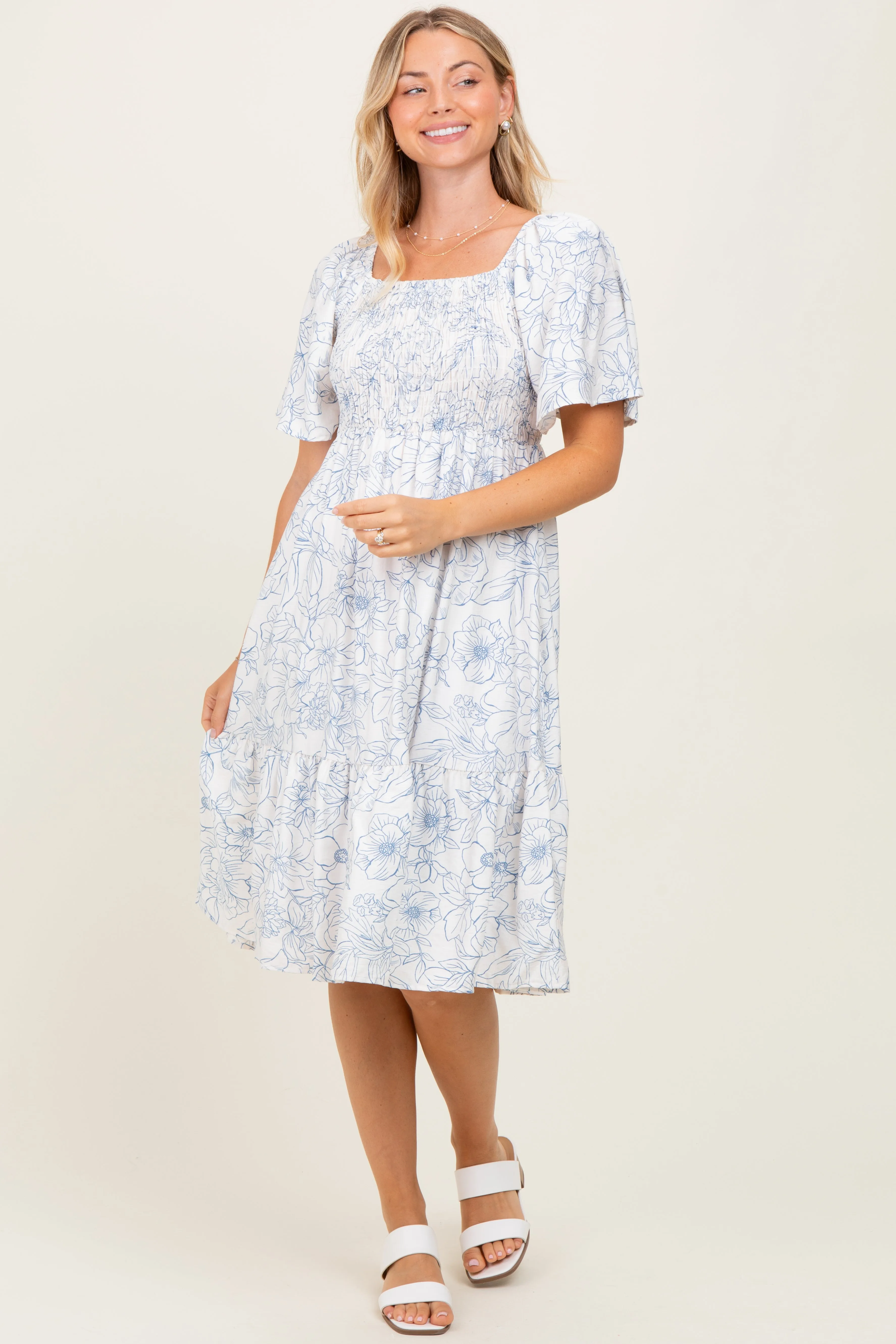 Ivory Floral Smocked Flutter Sleeve Midi Dress sold by Pinkblush