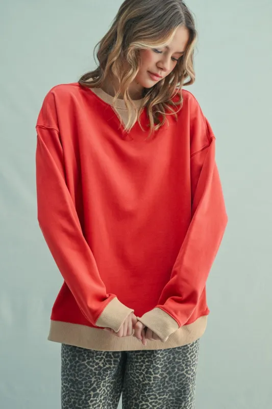 Red Colorblock Pullover Top sold by Pinkblush