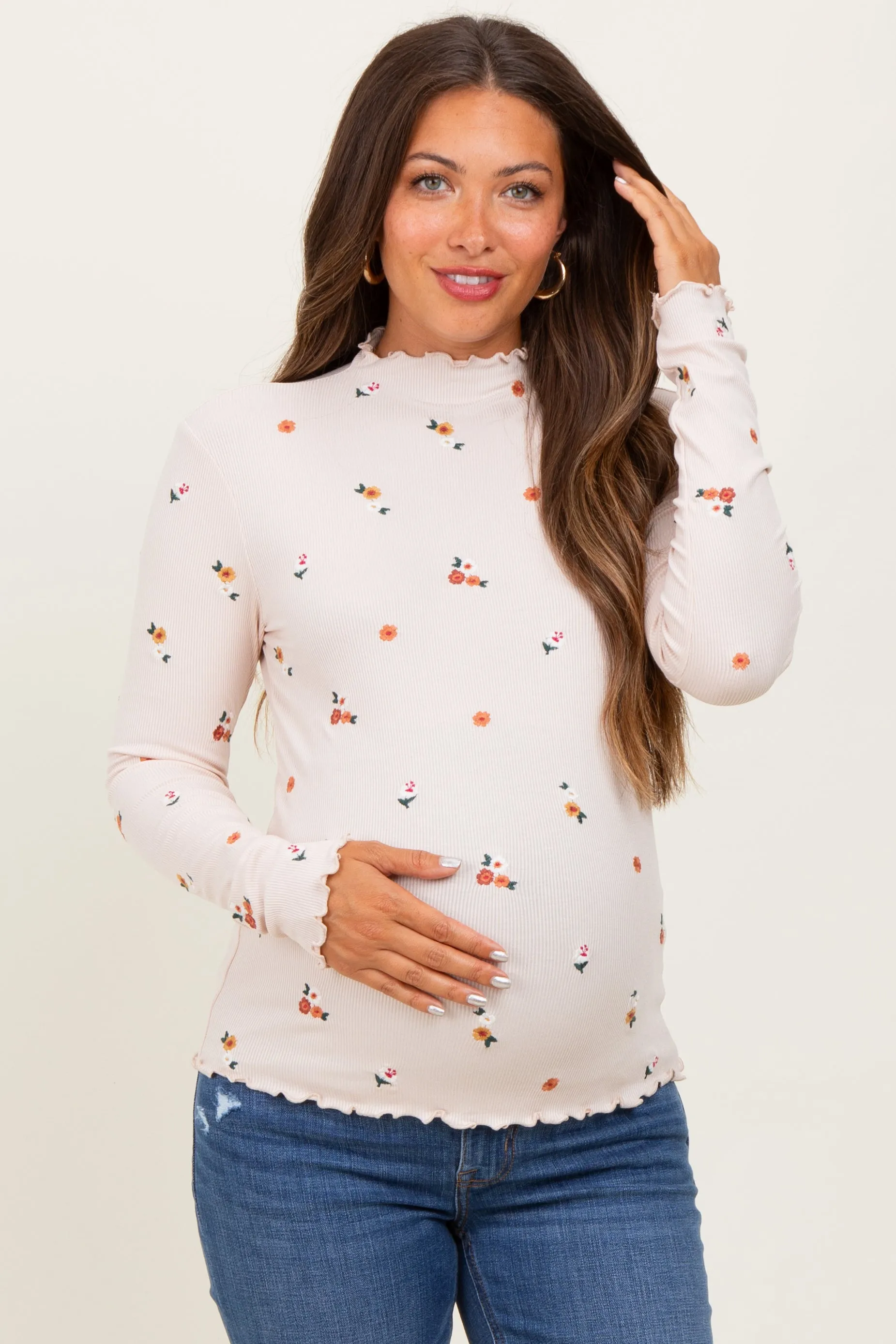 Ecru Knit Embroidered Floral Ruffle Hem Maternity Top sold by Pinkblush