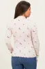 Ecru Knit Embroidered Floral Ruffle Hem Maternity Top sold by Pinkblush