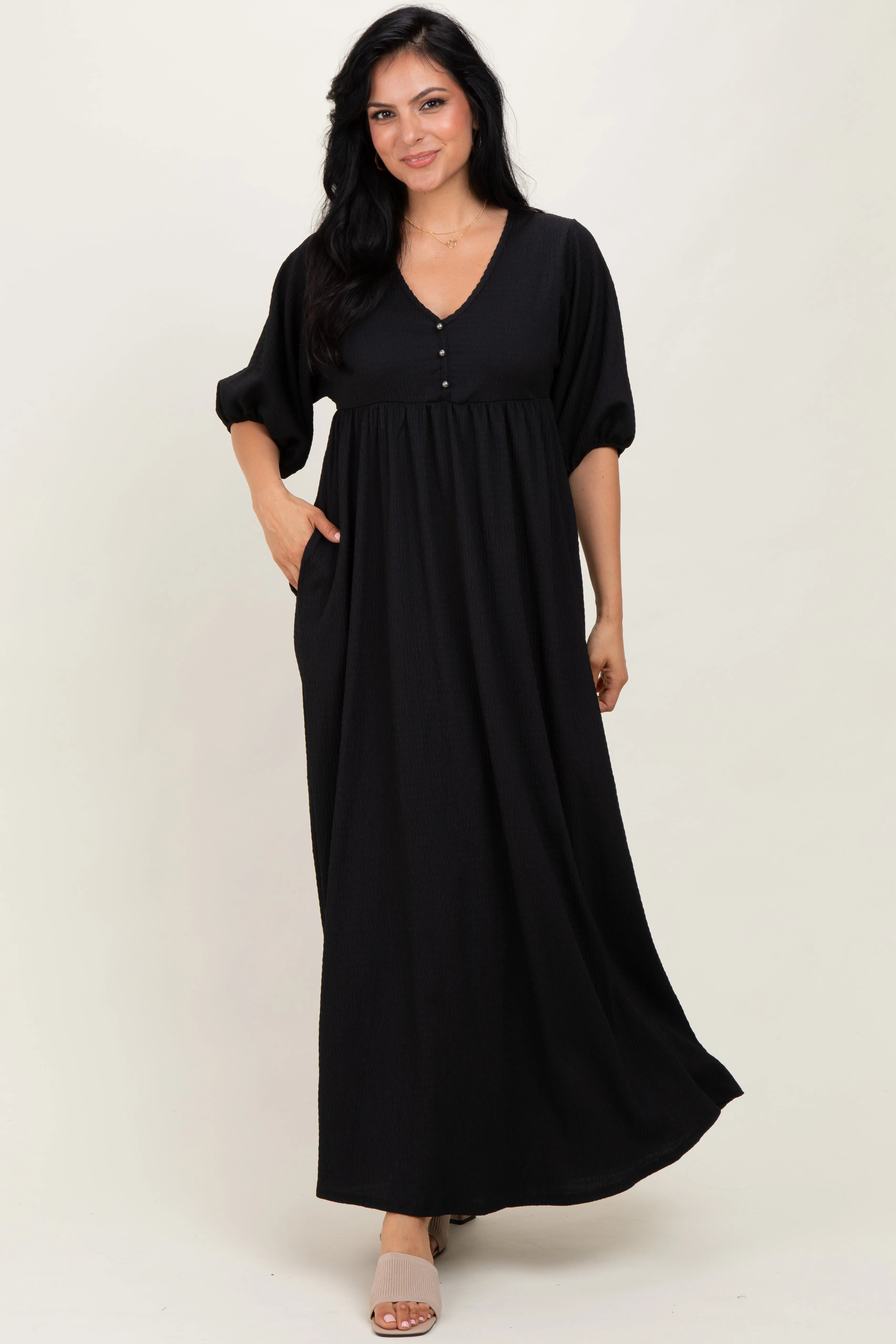 Black Solid Woven 3/4 Sleeve V-Neck Button Down Maxi Dress sold by Pinkblush