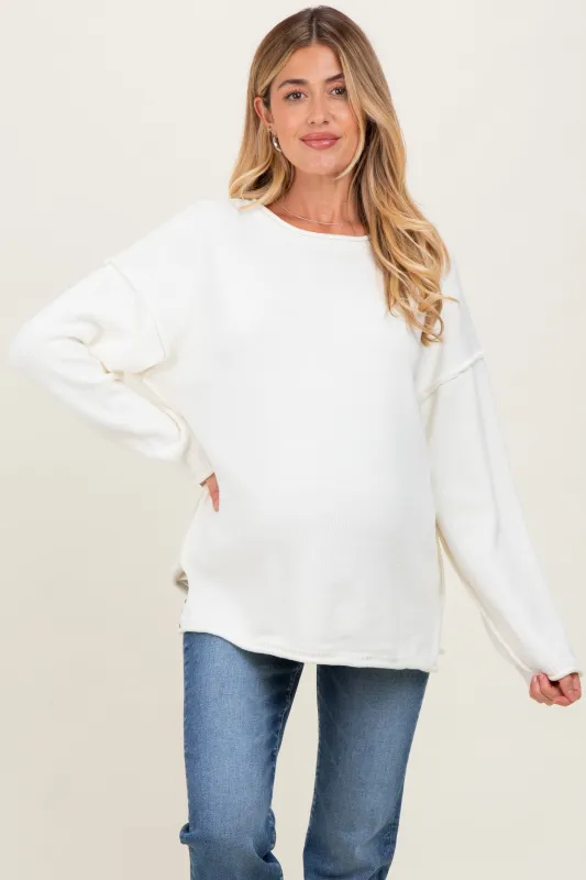 Ivory Oversized Exposed Seam Maternity Sweater sold by Pinkblush