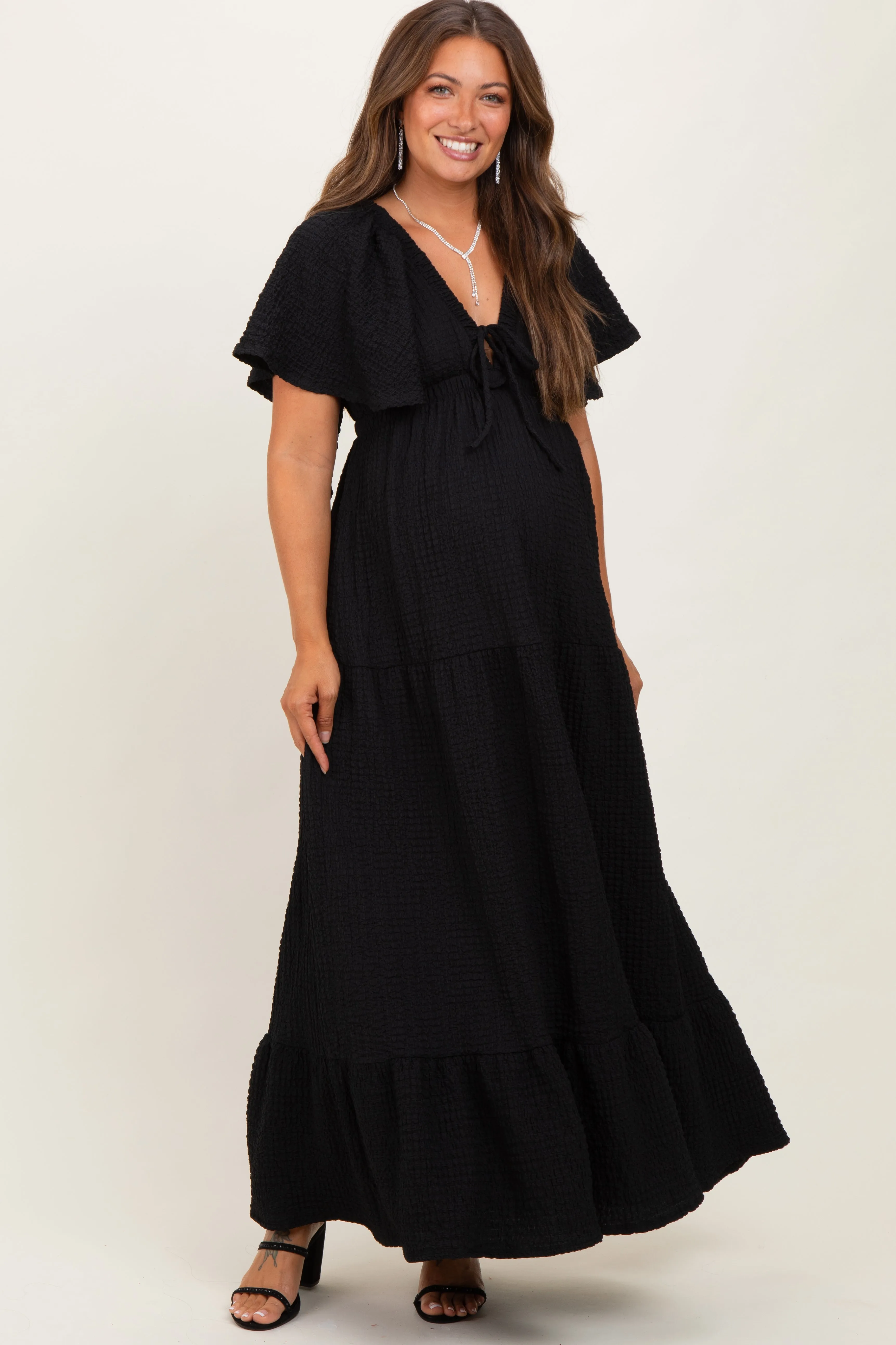 Black Woven Textured Flutter Sleeve V-Neck Tiered Maternity Maxi Dress sold by Pinkblush