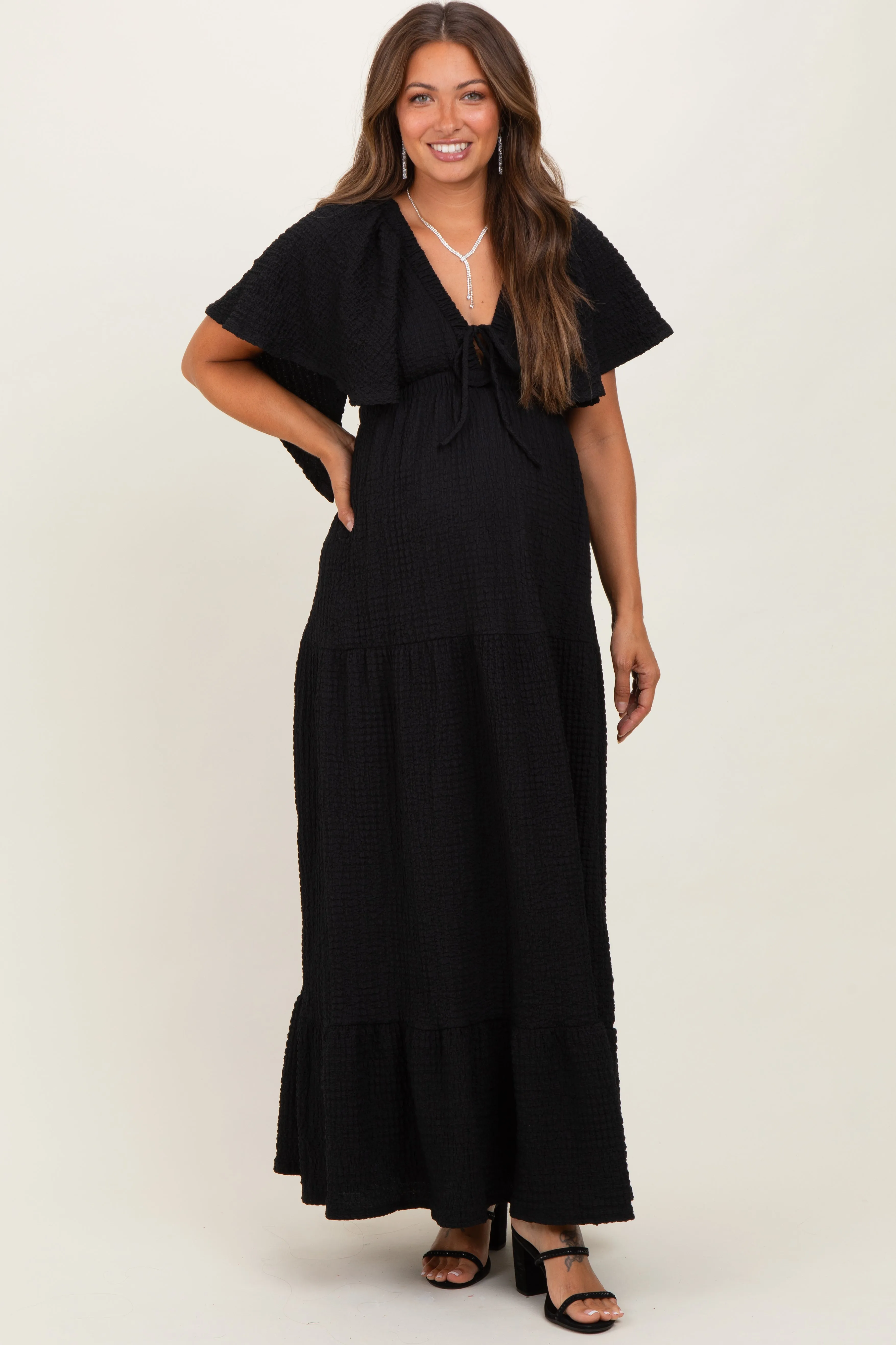 Black Woven Textured Flutter Sleeve V-Neck Tiered Maternity Maxi Dress sold by Pinkblush product image thumbnail 2