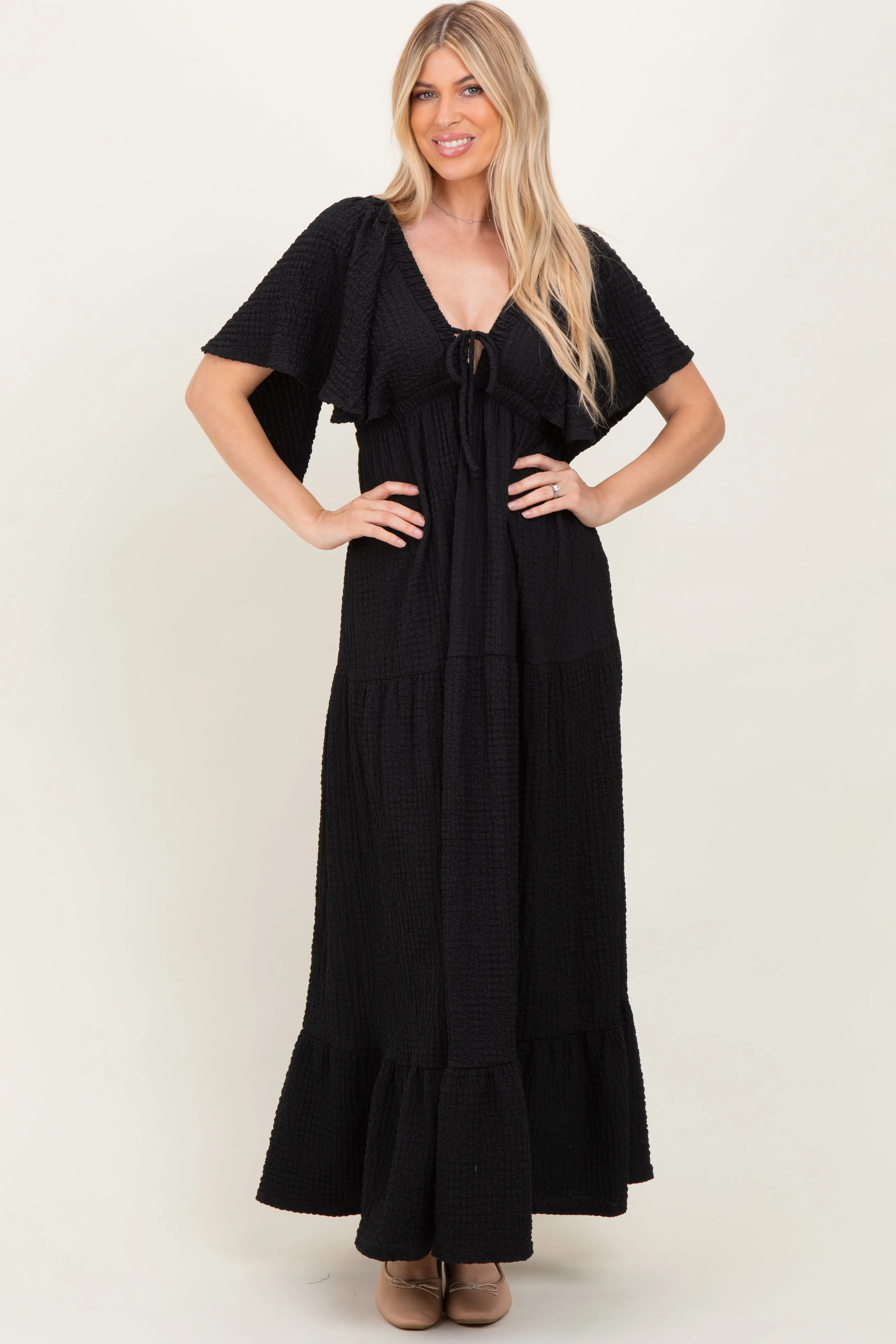 Black Woven Textured Flutter Sleeve V-Neck Tiered Maxi Dress sold by Pinkblush