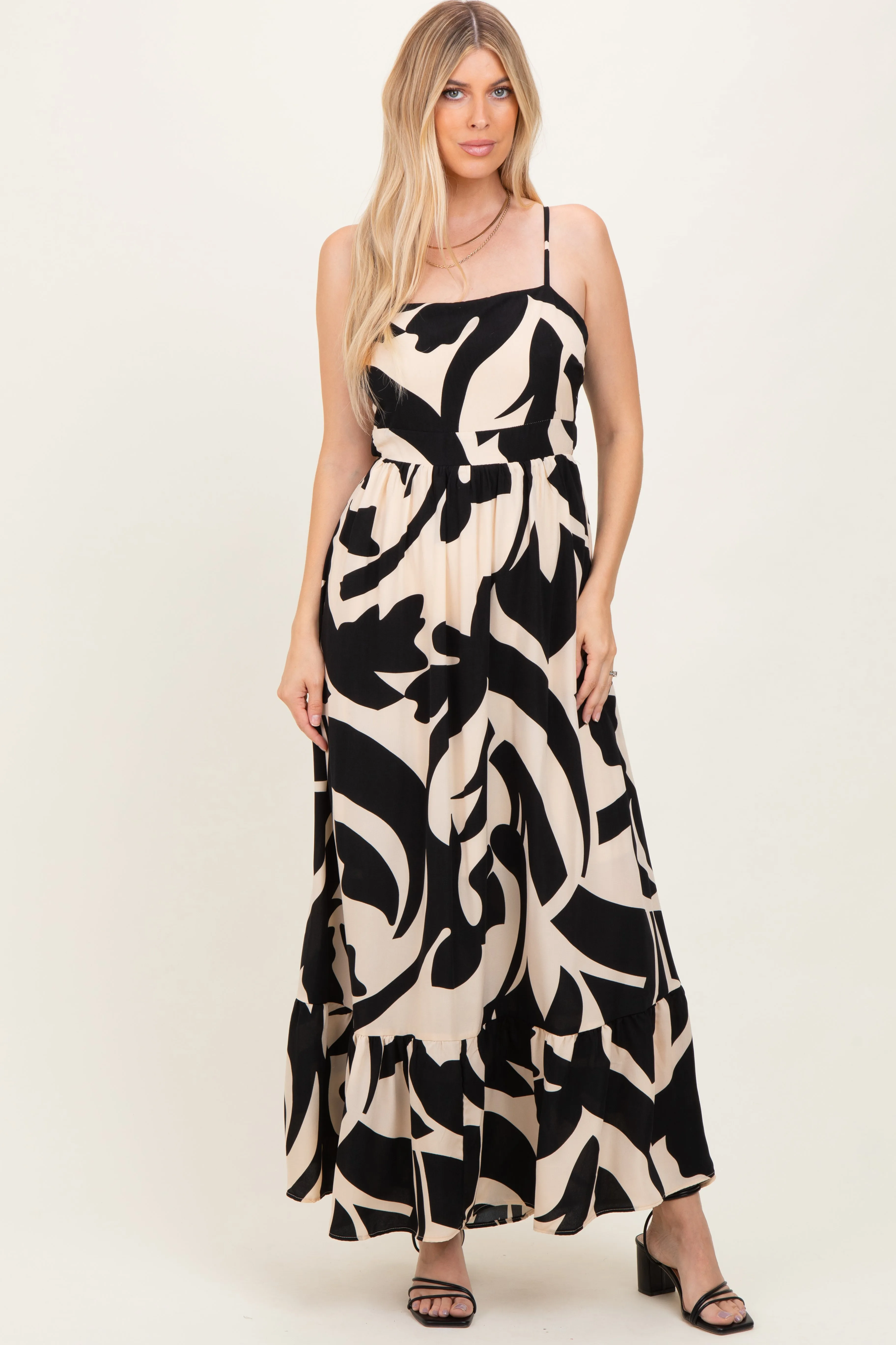 Black Printed Sleeveless Cutout Tie Back Maxi Dress sold by Pinkblush