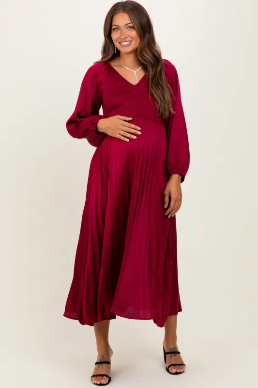 Burgundy Satin Smocked Pleated Maternity Midi Dress sold by Pinkblush