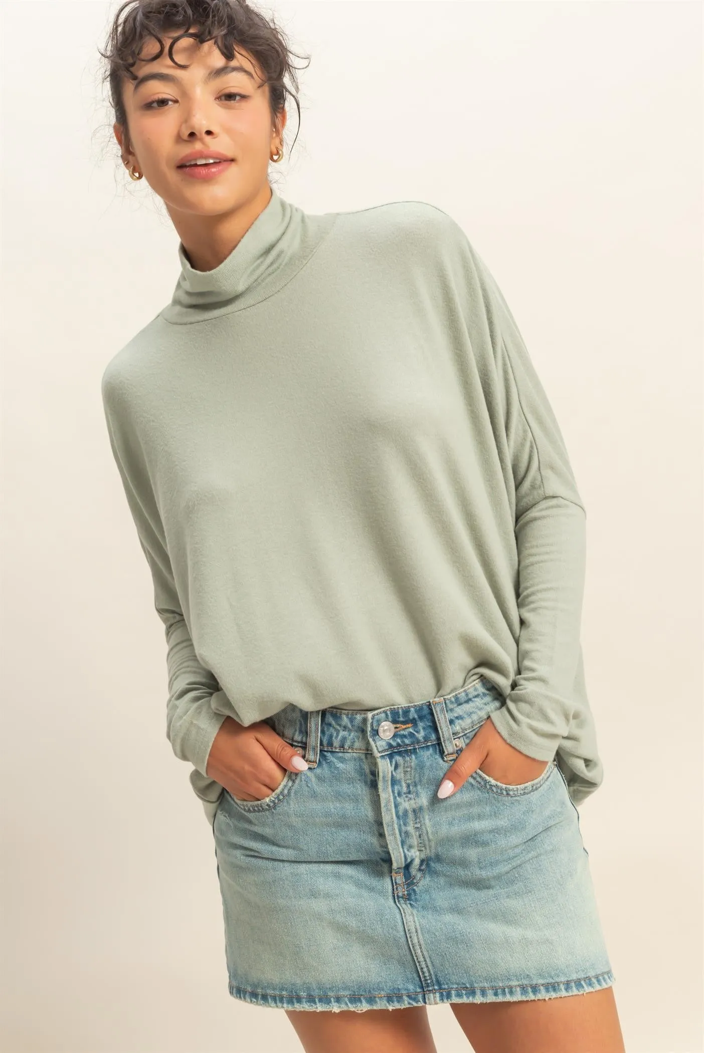 Sage Draped Oversized Turtleneck Dolman Sleeve Top sold by Pinkblush