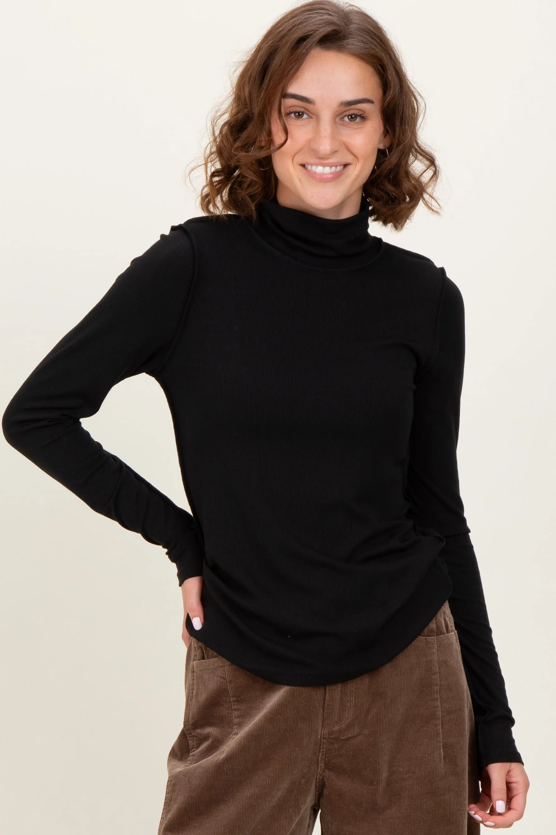 Black Solid Long Sleeve Ribbed Turtle Neck Top sold by Pinkblush