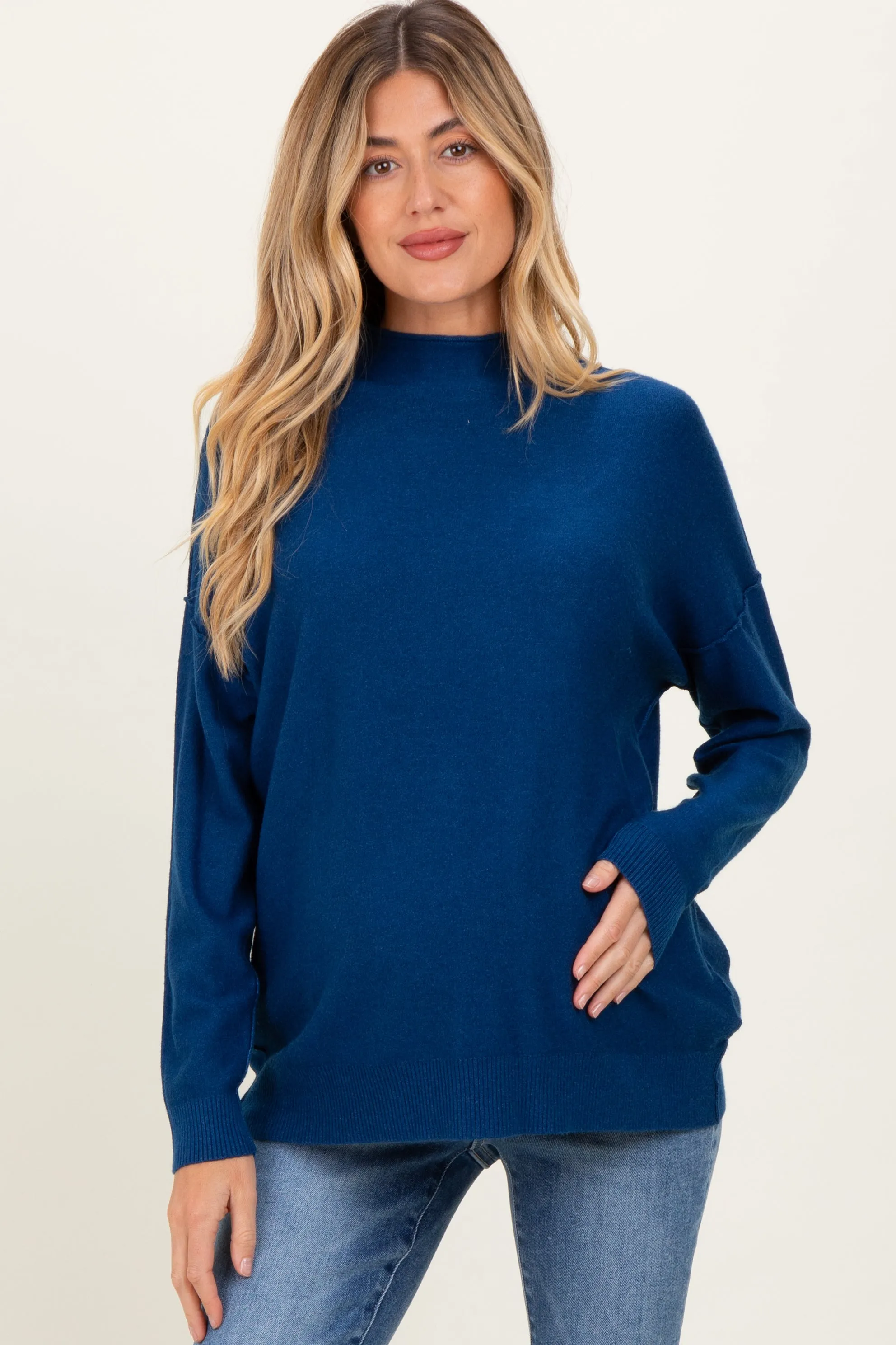 Navy Mock Neck Exposed Seam Maternity Sweater sold by Pinkblush