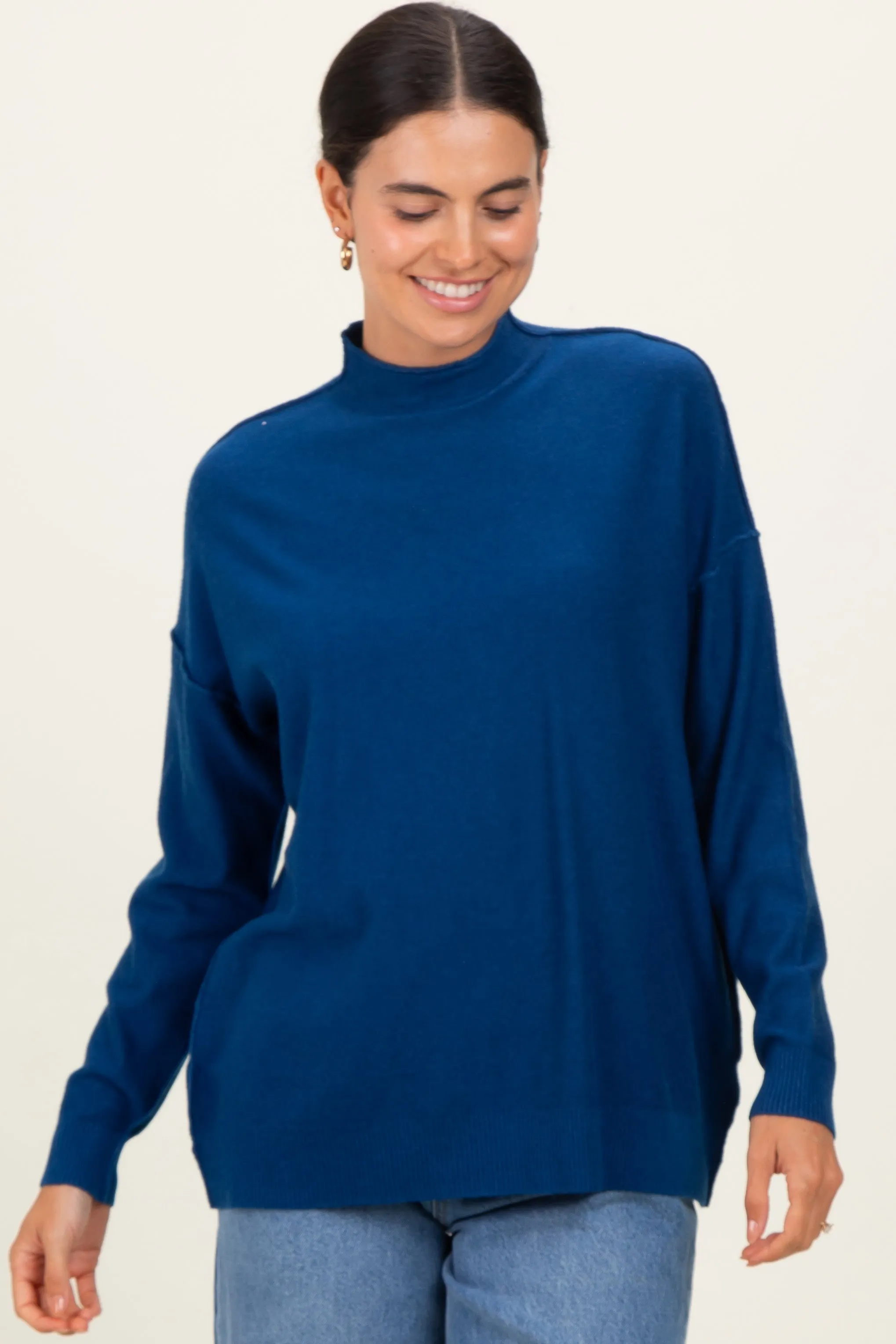 Navy Mock Neck Exposed Seam Sweater sold by Pinkblush