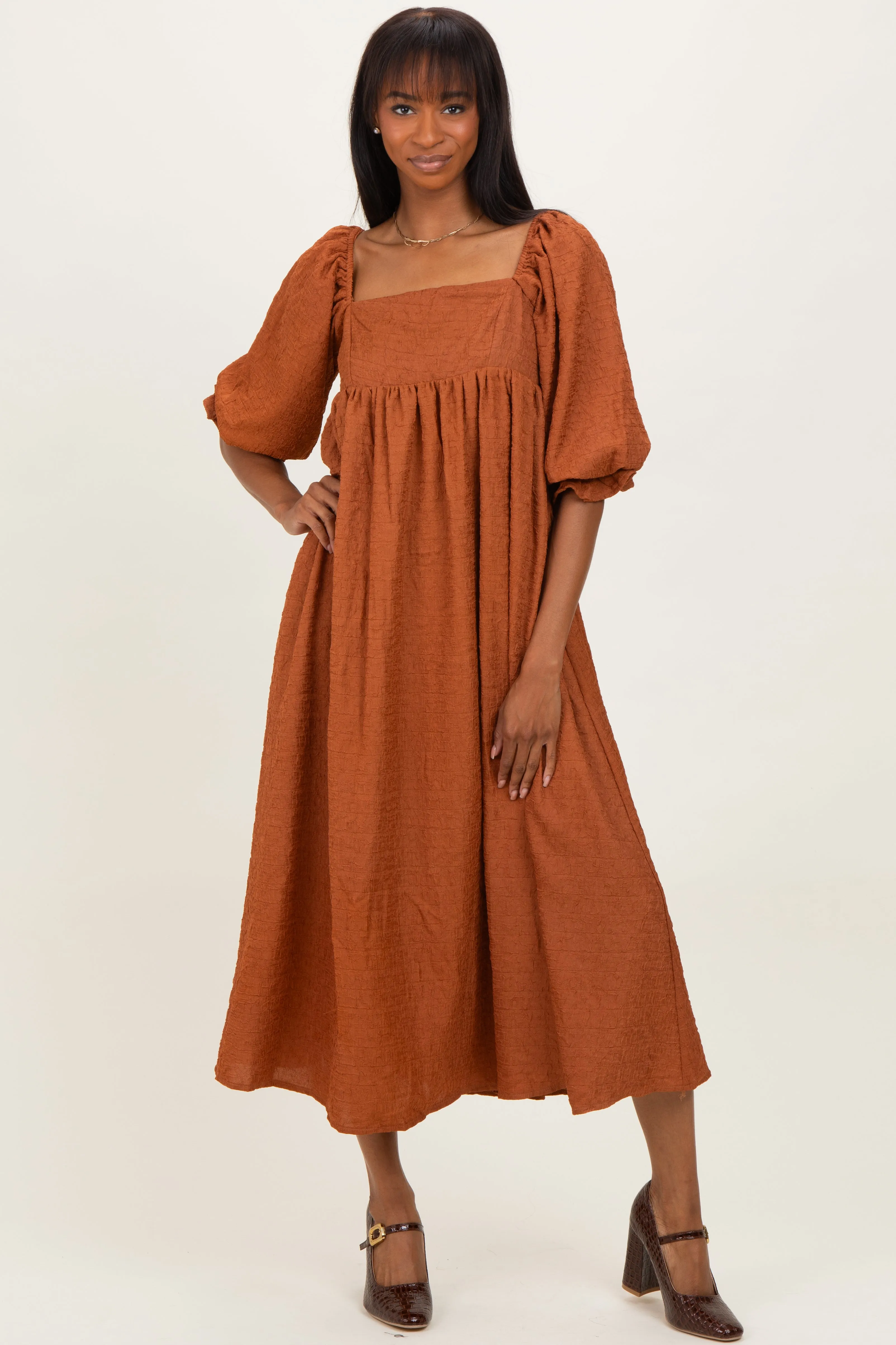 Rust Textured 3/4 Puff Sleeve Maxi Dress sold by Pinkblush