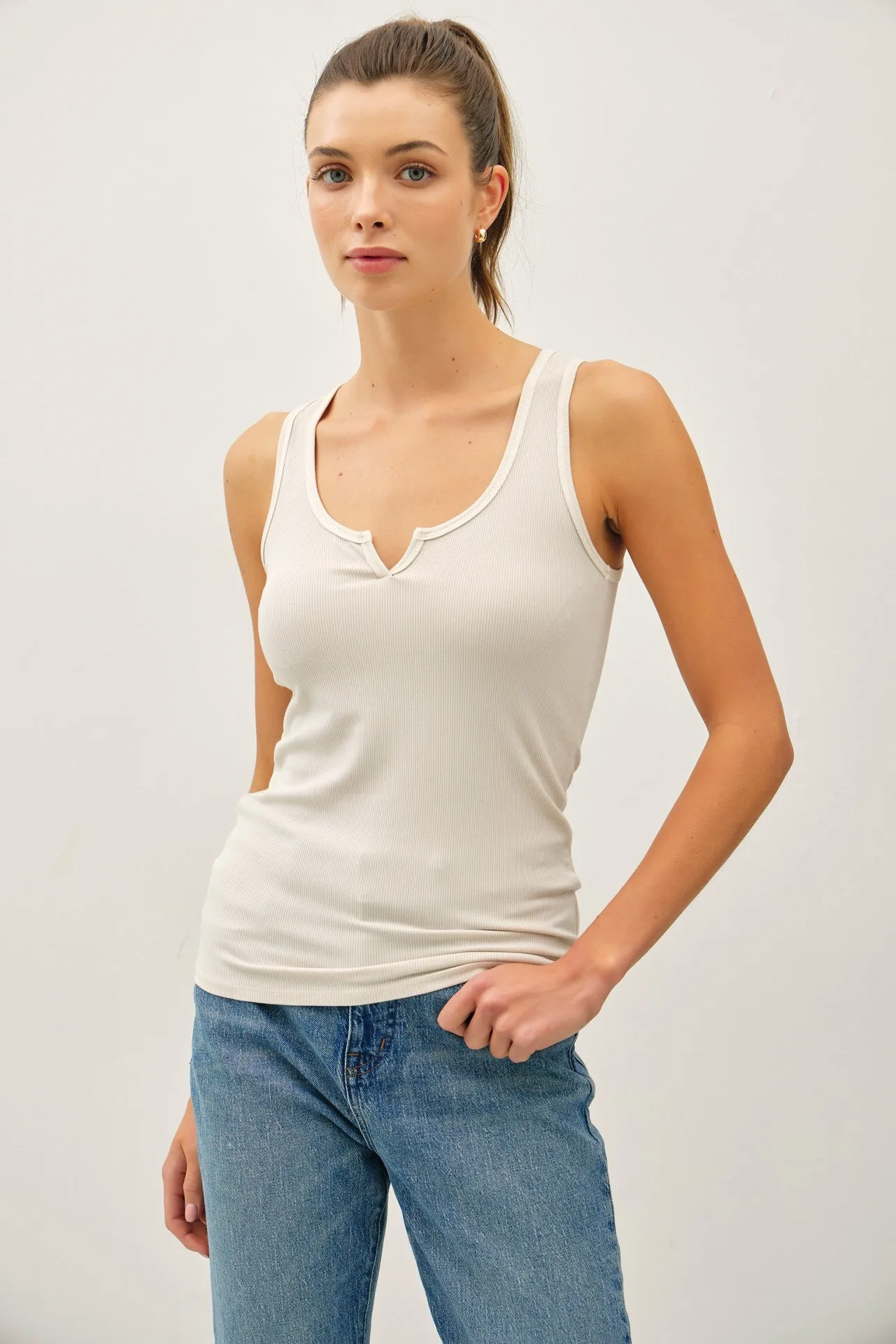 Cream Ribbed Split Neck Tank Top sold by Pinkblush