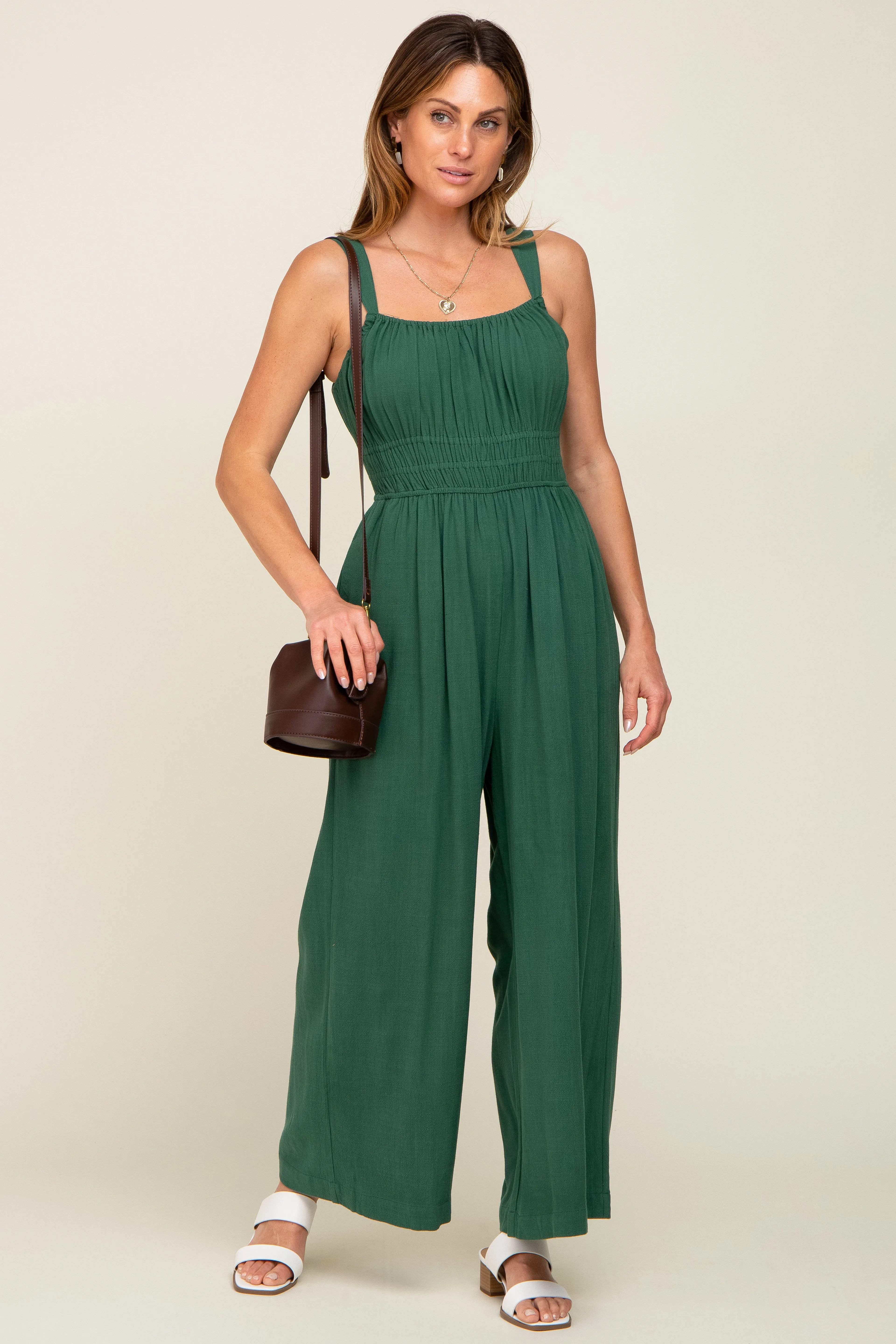 Green Smocked Square Neck Sleeveless Linen Jumpsuit sold by Pinkblush