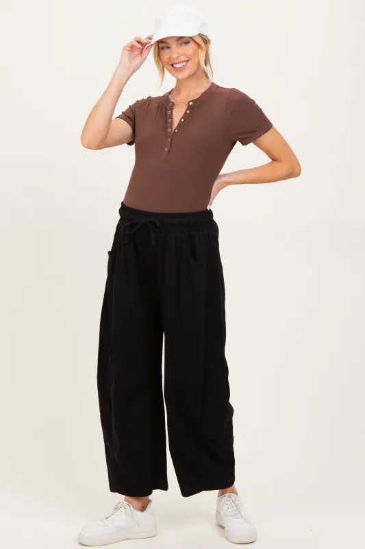 Black Barrel Leg Terry Maternity Sweatpants made by Pinkblush