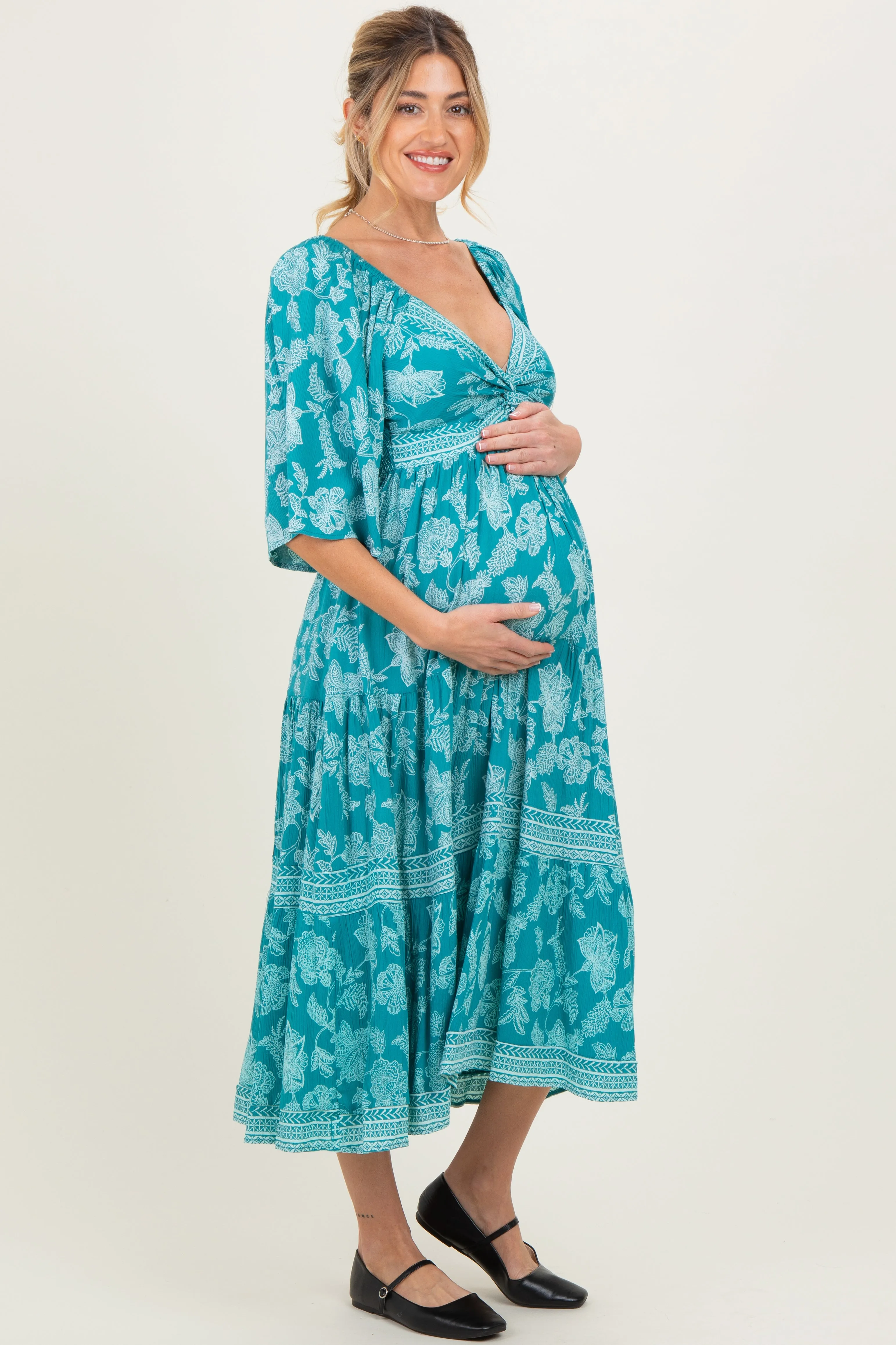 Turquoise Floral Twisted Front Flutter Sleeve Maternity Midi Dress sold by Pinkblush product image thumbnail 3