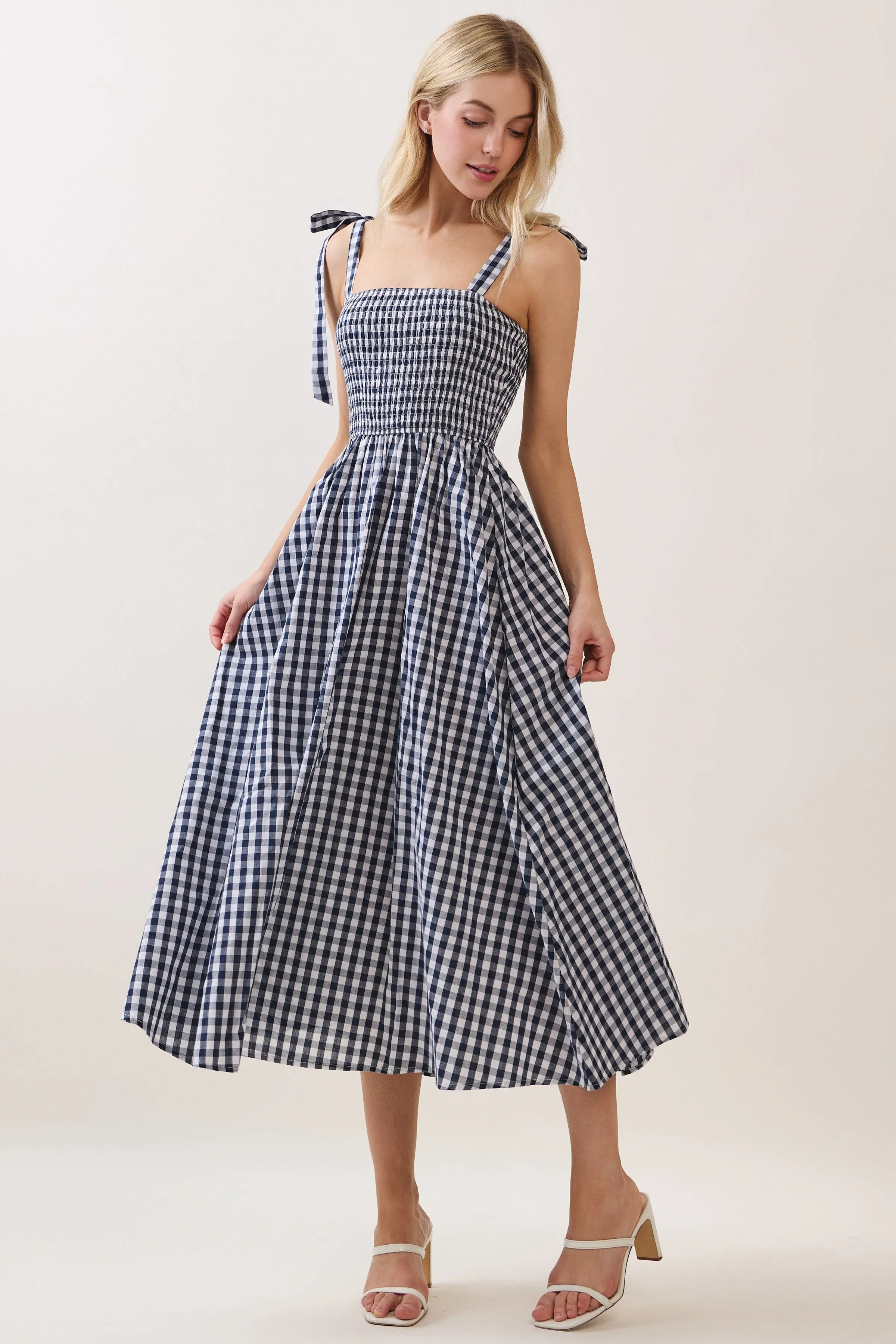 Navy Gingham Smocked Shoulder Tie Midi Dress sold by Pinkblush