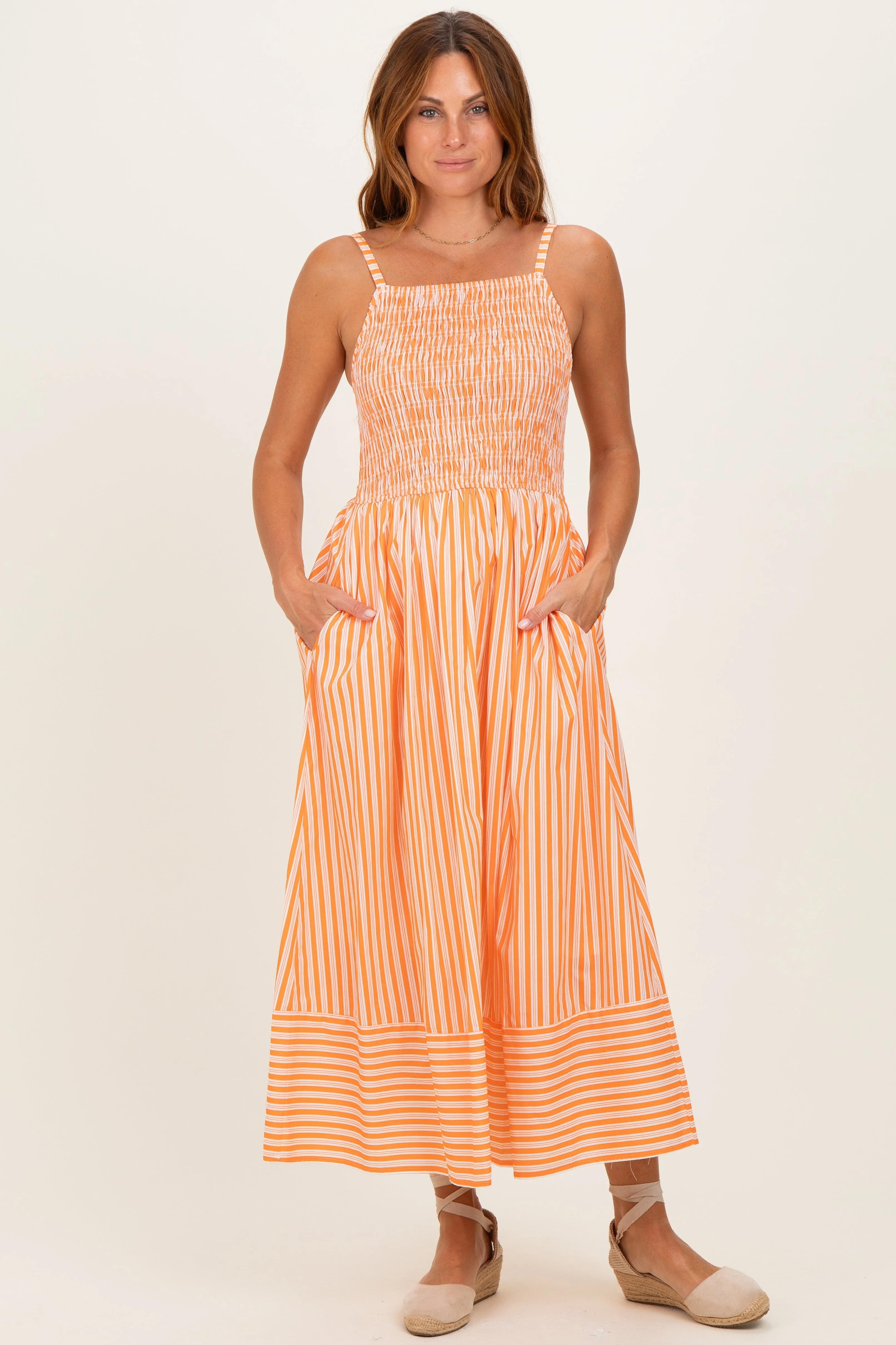 Orange Striped Smocked Midi Dress sold by Pinkblush
