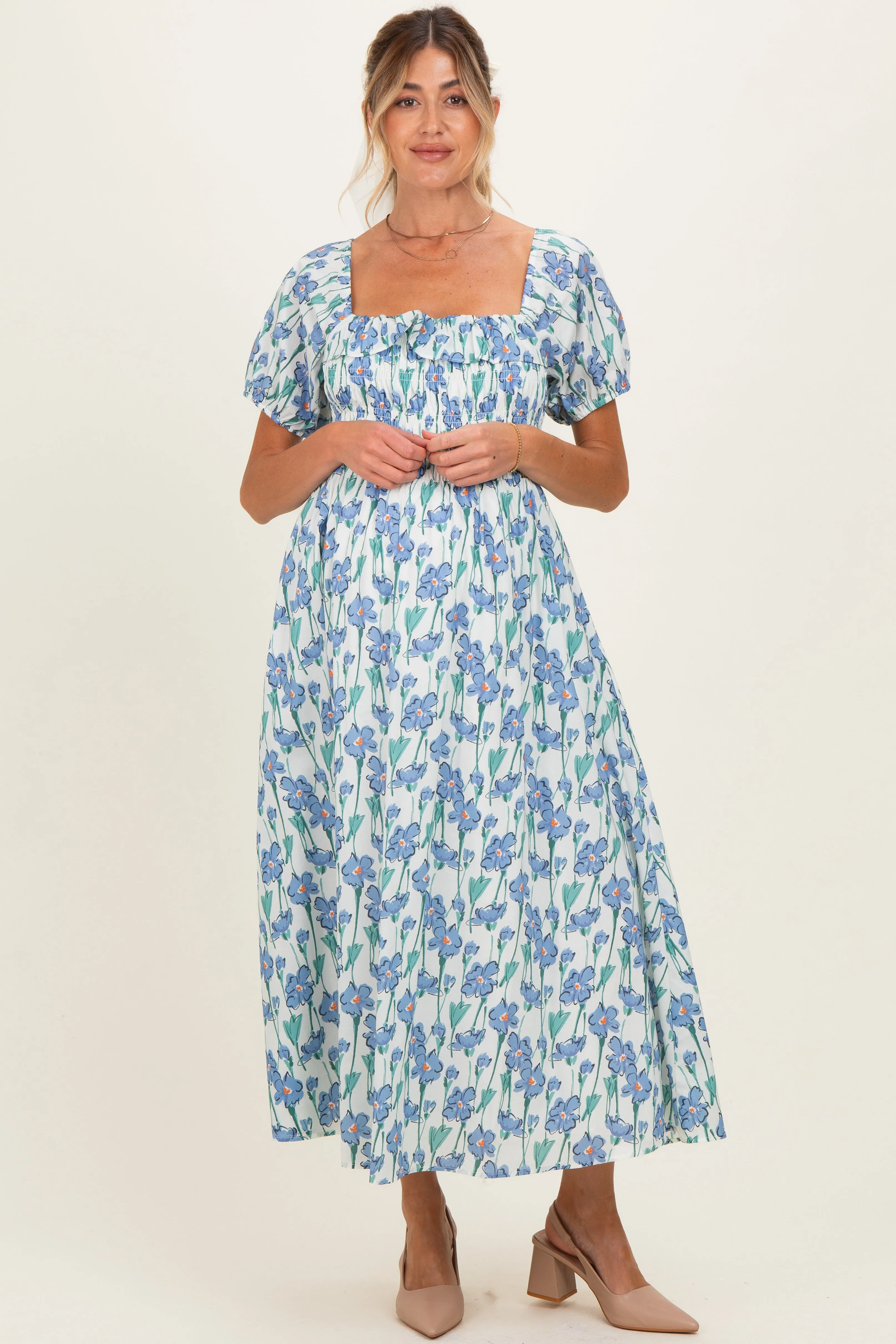Blue Floral Smocked Ruffle Accent Maternity Midi Dress sold by Pinkblush