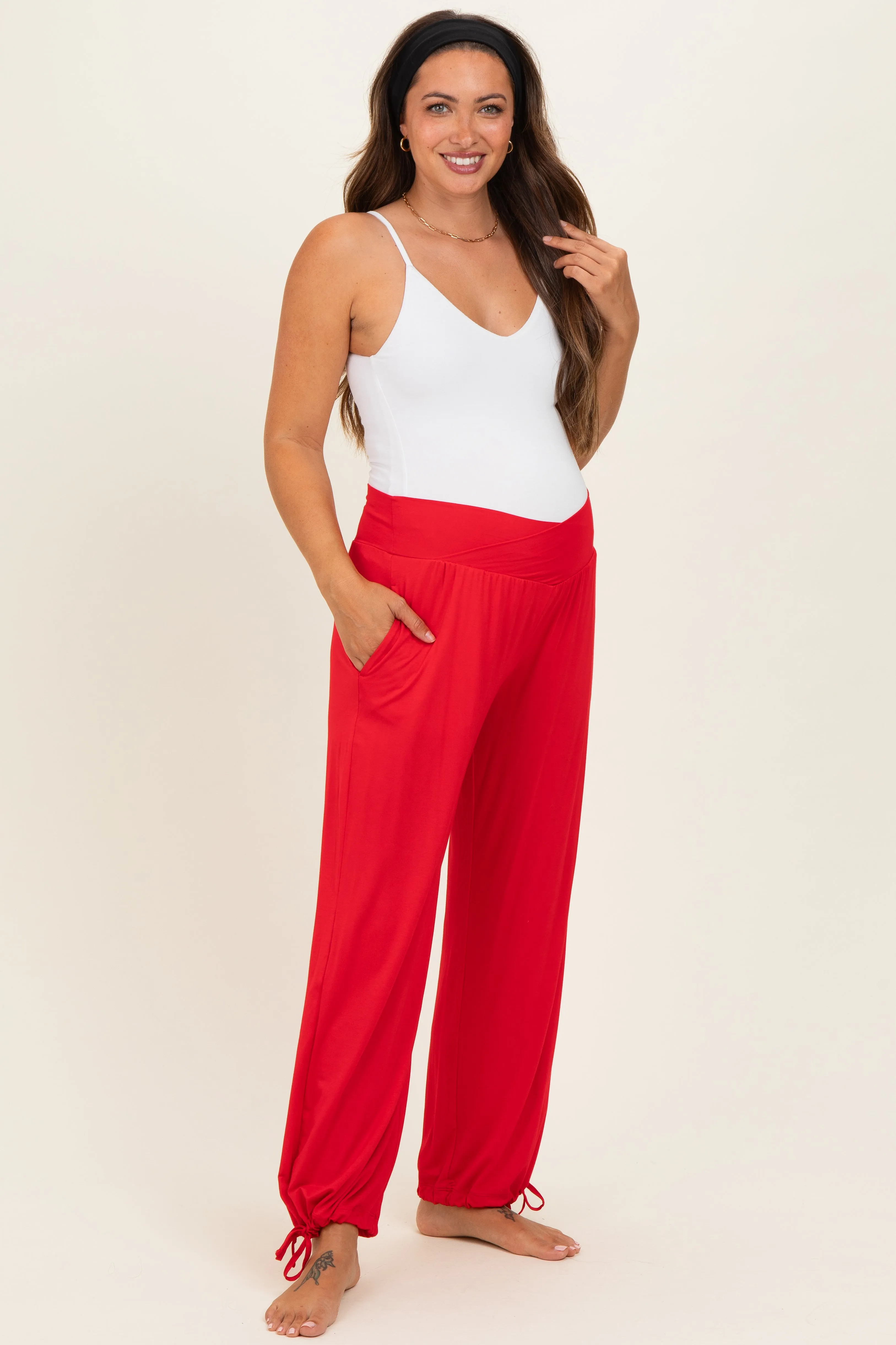 Red Crossover Waist Maternity Pants sold by Pinkblush