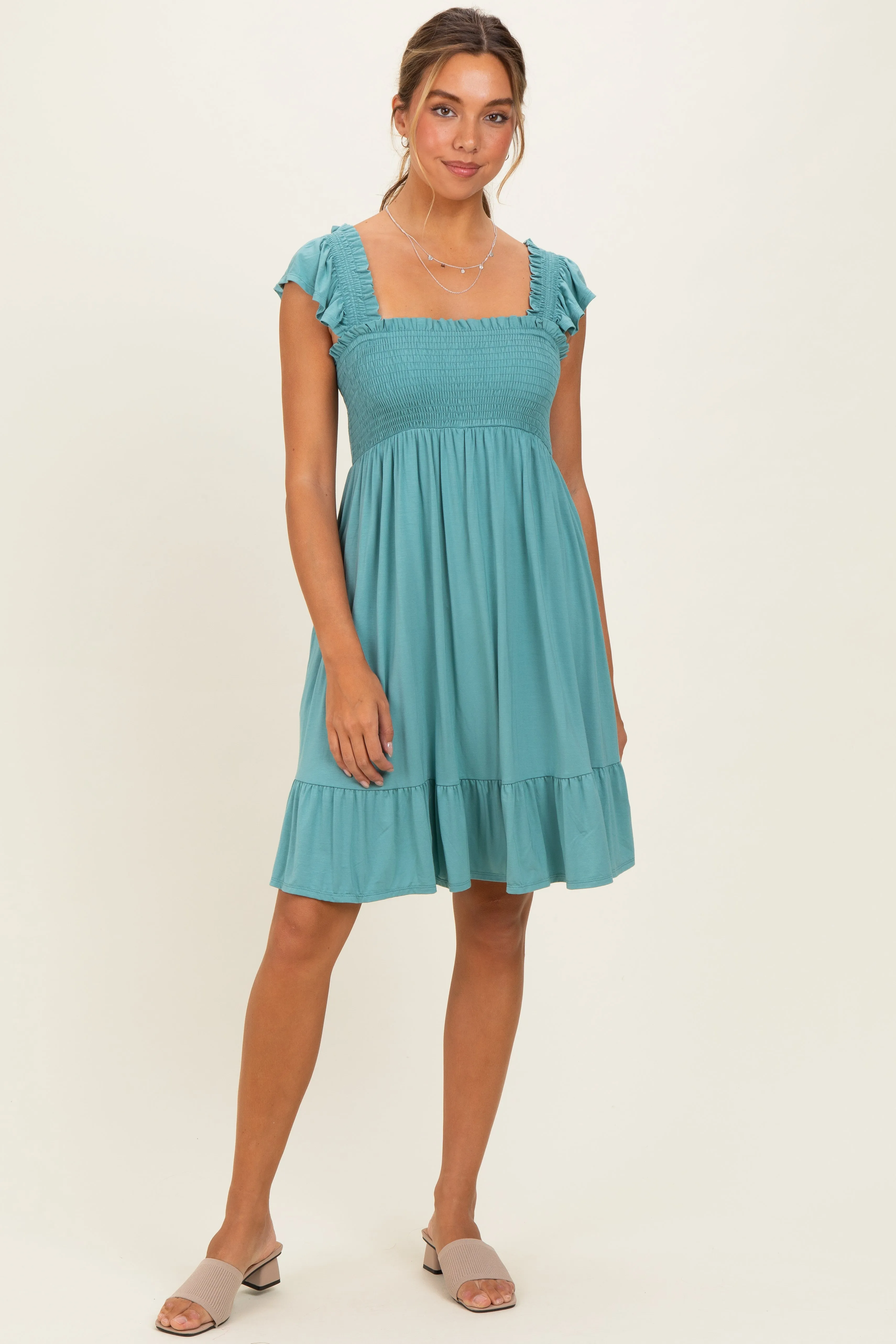 Sage Smocked Tiered Mini Dress sold by Pinkblush