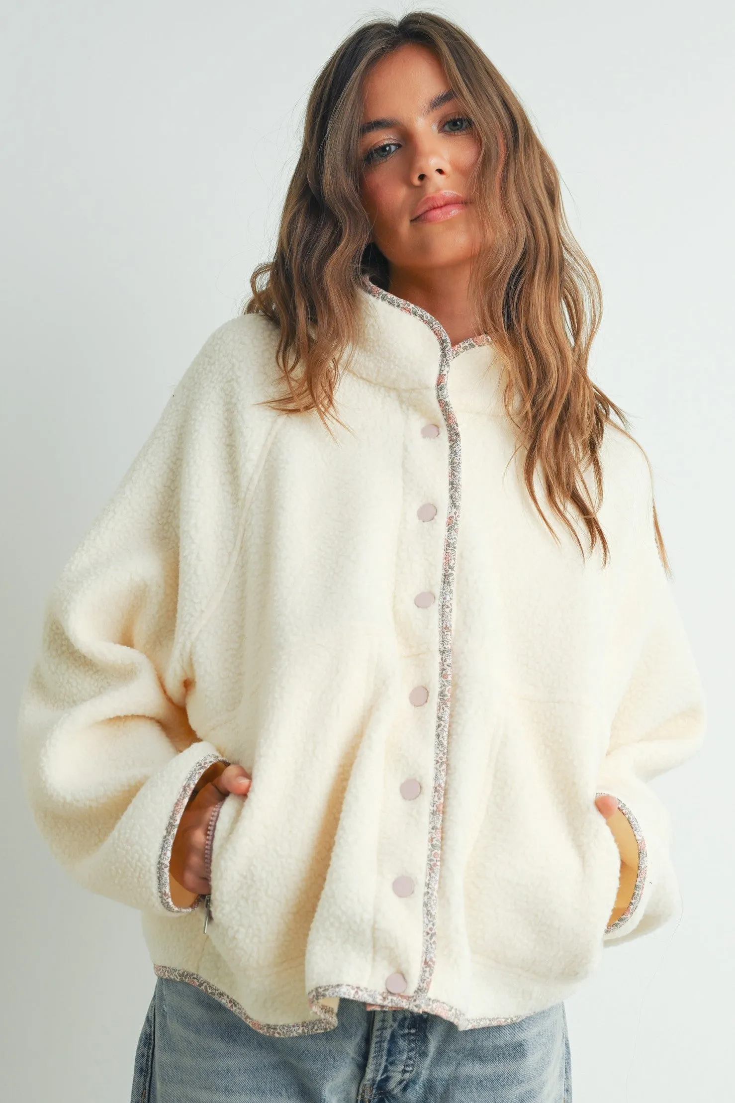 Ivory Floral Trim Fleece Snap Button Jacket sold by Pinkblush